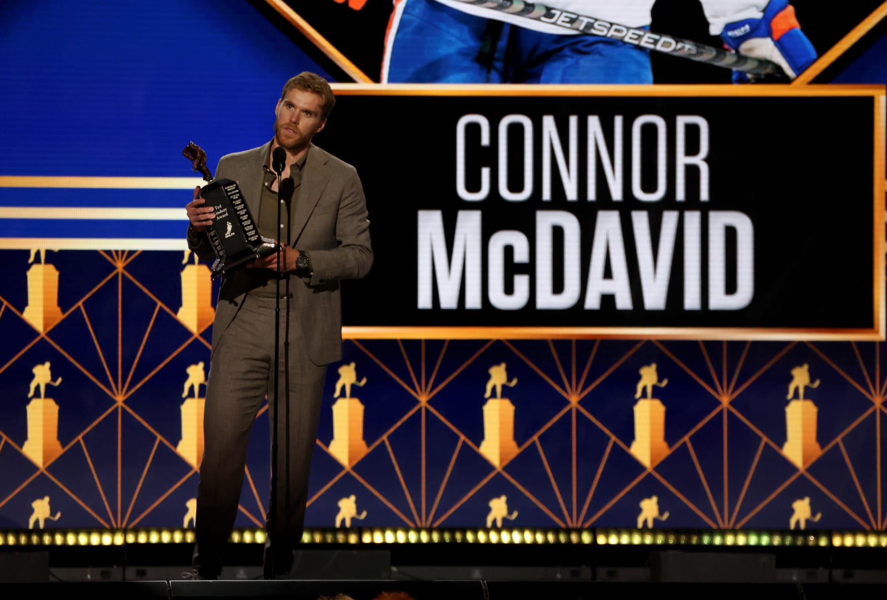 NASHVILLE, TENNESSEE - JUNE 26: Connor McDavid of the Edmonton Oilers speaks onstage after being awarded the Ted Lindsay Award at the 2023 NHL Awards at Bridgestone Arena on June 26, 2023 in Nashville, Tennessee. (Photo by Dave Sandford/NHLI via Getty Images)