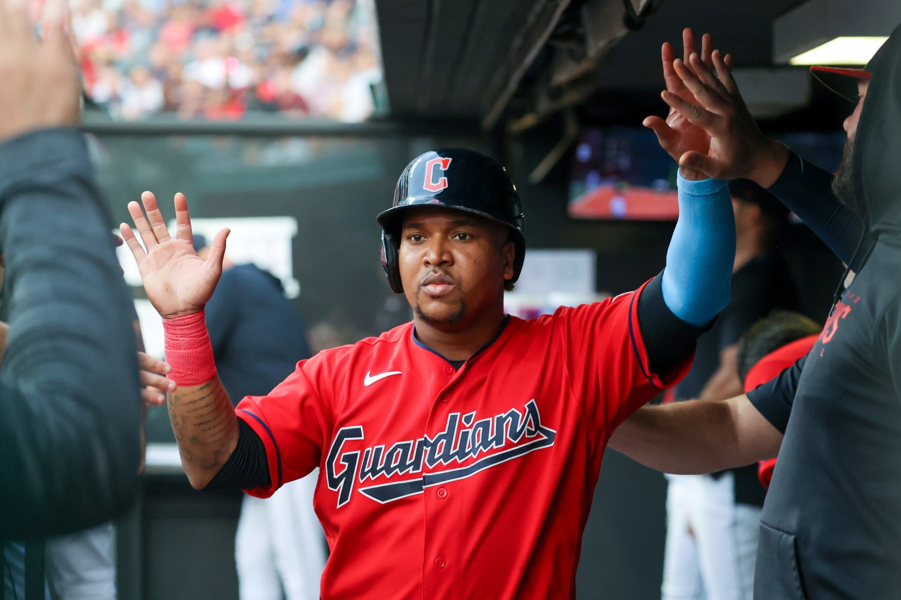 CLEVELAND, OH - JUNE 21: Cleveland Guardians third baseman Jose Ramirez (11) is congratulated by teammates after scoring a run during the fifth inning of the Major League Baseball game between the Oakland Athletics and Cleveland Guardians on June 21, 2023, at Progressive Field in Cleveland, OH. (Photo by Frank Jansky/Icon Sportswire via Getty Images)