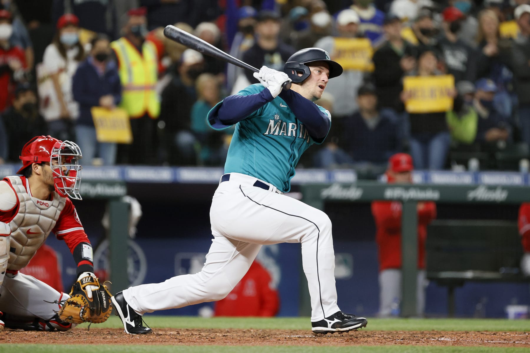 SEATTLE, WASHINGTON - OCTOBER 01: Kyle Seager #15 of the Seattle Mariners watches his double against the Los Angeles Angels during the ninth inning at T-Mobile Park on October 01, 2021 in Seattle, Washington. (Photo by Steph Chambers/Getty Images)