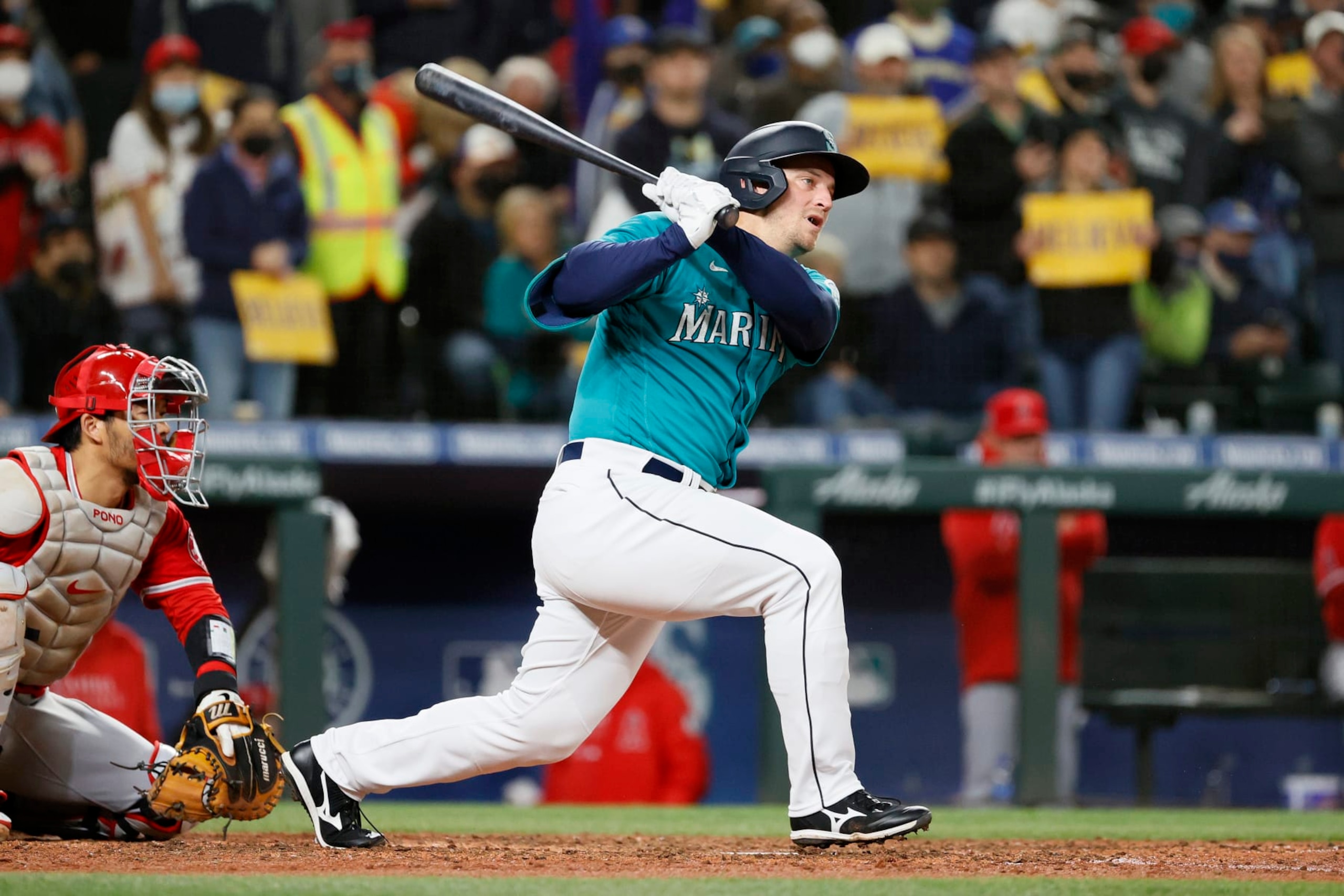 SEATTLE, WASHINGTON - OCTOBER 01: Kyle Seager #15 of the Seattle Mariners watches his double against the Los Angeles Angels during the ninth inning at T-Mobile Park on October 01, 2021 in Seattle, Washington. (Photo by Steph Chambers/Getty Images)