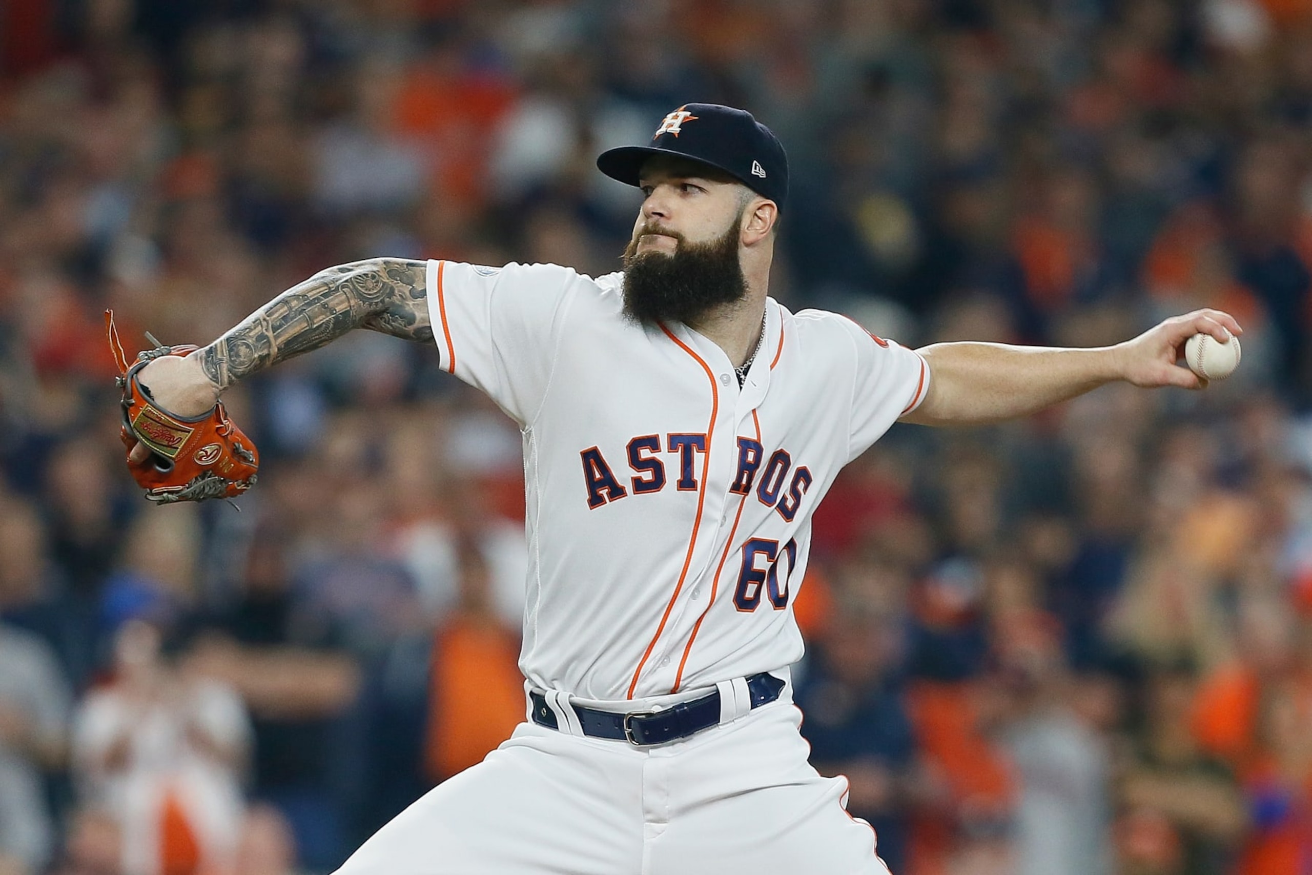 HOUSTON, TX - OCTOBER 16:  Dallas Keuchel #60 of the Houston Astros pitches in the first inning against the Boston Red Sox during Game Three of the American League Championship Series at Minute Maid Park on October 16, 2018 in Houston, Texas.  (Photo by Bob Levey/Getty Images)