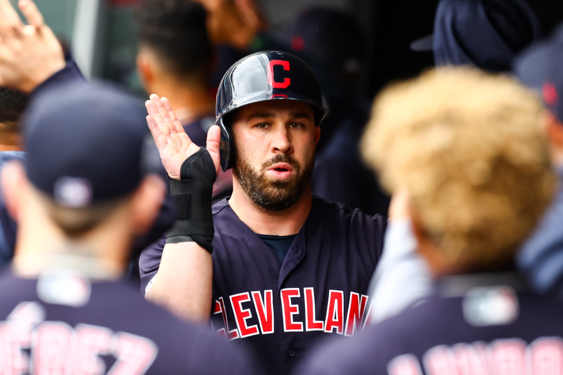 MINNEAPOLIS, MINNESOTA - SEPTEMBER 08: Jason Kipnis #22 of the Cleveland Indians is congratulated after Franmil Reyes #32 hit a two-run single in the second inning against the Minnesota Twins during the game at Target Field on September 08, 2019 in Minneapolis, Minnesota. (Photo by David Berding/Getty Images)