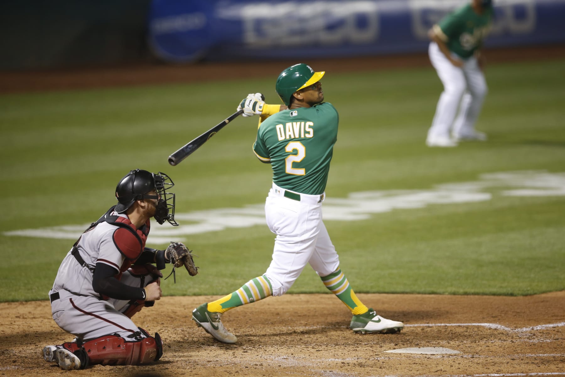 OAKLAND, CA - AUGUST 20: Khris Davis #2 of the Oakland Athletics bats during the game against the Arizona Diamondbacks at RingCentral Coliseum on August 20, 2020 in Oakland, California. The Athletics defeated the Diamondbacks 5-1. (Photo by Michael Zagaris/Oakland Athletics/Getty Images)