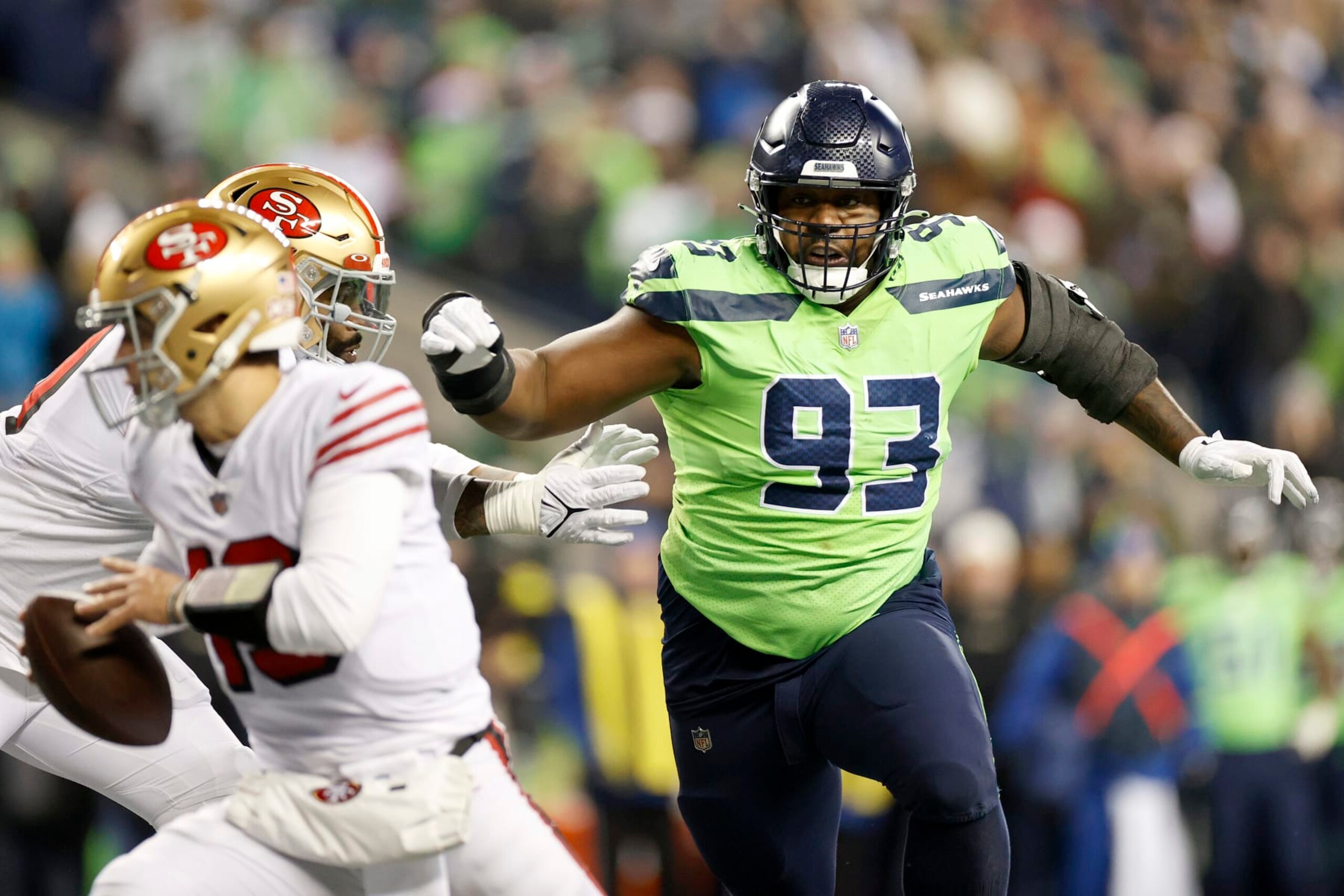 SEATTLE, WASHINGTON - DECEMBER 15: Shelby Harris #93 of the Seattle Seahawks pressures Brock Purdy #13 of the San Francisco 49ers during the fourth quarter at Lumen Field on December 15, 2022 in Seattle, Washington. (Photo by Steph Chambers/Getty Images) SEATTLE, WASHINGTON - DECEMBER 15: Shelby Harris #93 of the Seattle Seahawks pressures Brock Purdy #13 of the San Francisco 49ers during the fourth quarter at Lumen Field on December 15, 2022 in Seattle, Washington. (Photo by Steph Chambers/Getty Images)