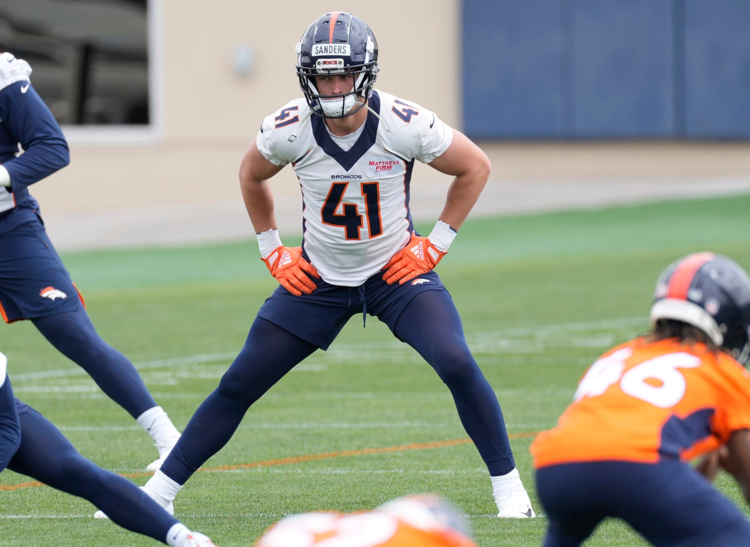 Denver Broncos inside linebacker Drew Sanders takes part in drills during an NFL football rookie minicamp, Saturday, May 13, 2023, at the team's headquarters in Centennial, Colo. (AP Photo/David Zalubowski) Denver Broncos inside linebacker Drew Sanders takes part in drills during an NFL football rookie minicamp, Saturday, May 13, 2023, at the team's headquarters in Centennial, Colo. (AP Photo/David Zalubowski)