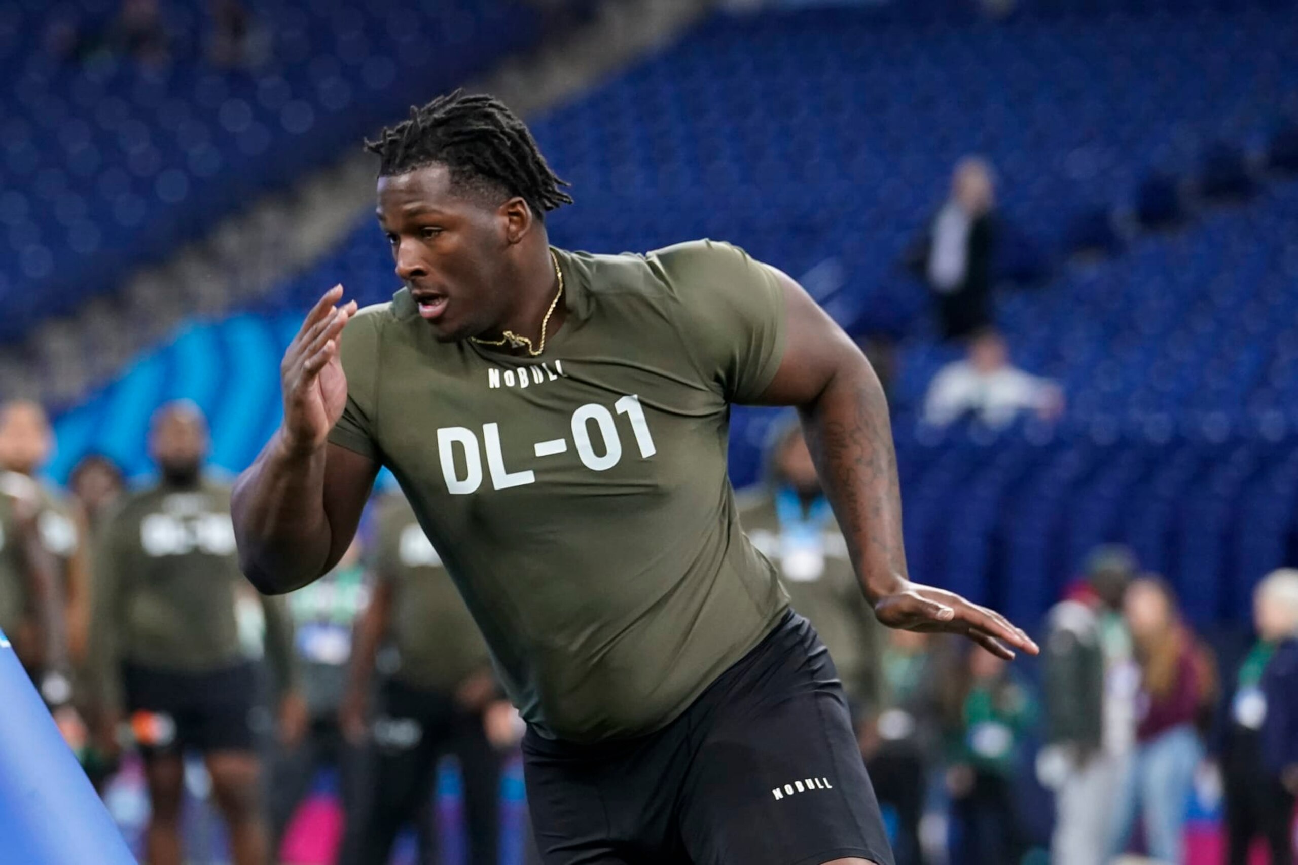 Wisconsin defensive lineman Keeanu Benton runs a drill at the NFL football scouting combine in Indianapolis, Thursday, March 2, 2023. (AP Photo/Michael Conroy) Wisconsin defensive lineman Keeanu Benton runs a drill at the NFL football scouting combine in Indianapolis, Thursday, March 2, 2023. (AP Photo/Michael Conroy)