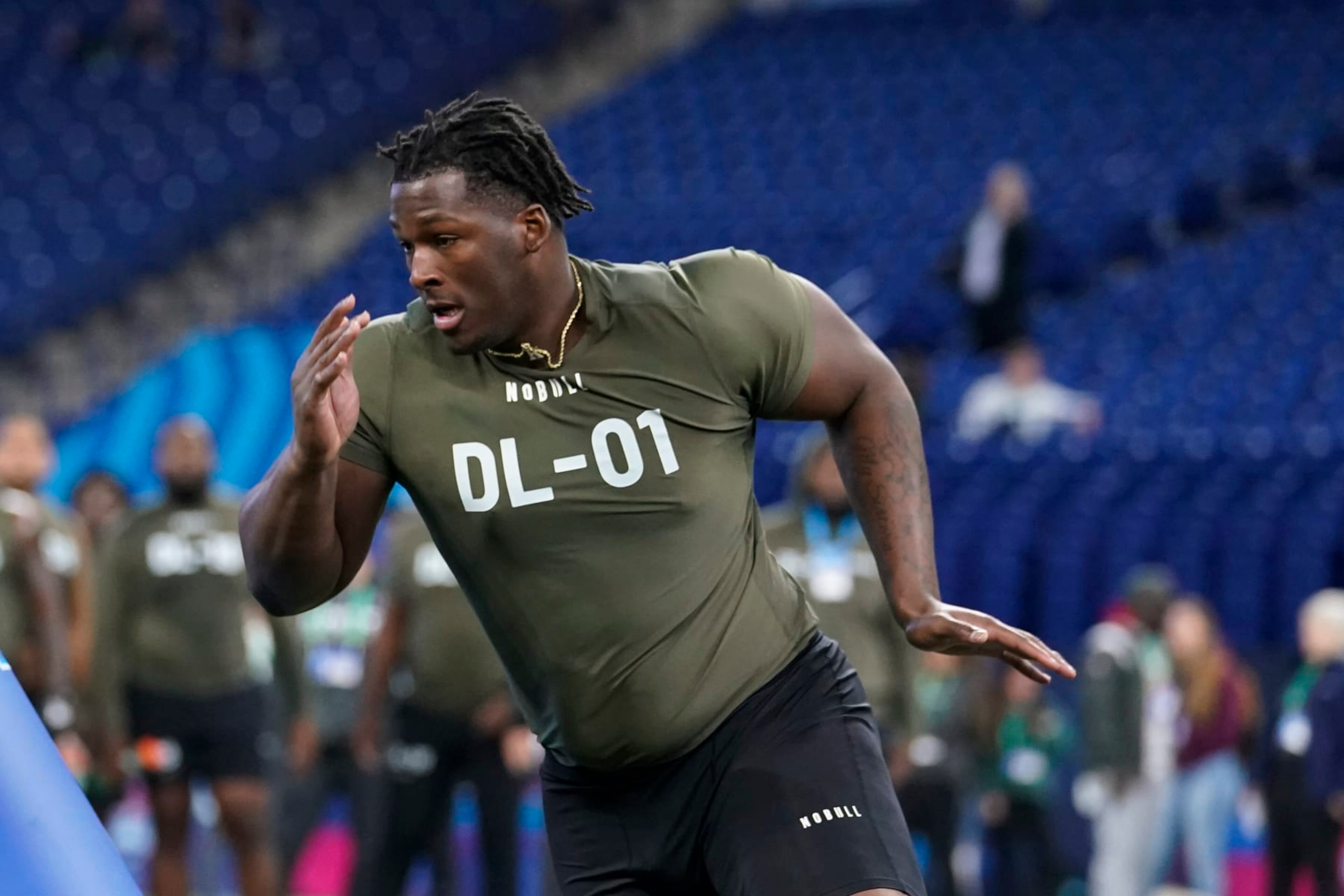 Wisconsin defensive lineman Keeanu Benton runs a drill at the NFL football scouting combine in Indianapolis, Thursday, March 2, 2023. (AP Photo/Michael Conroy) Wisconsin defensive lineman Keeanu Benton runs a drill at the NFL football scouting combine in Indianapolis, Thursday, March 2, 2023. (AP Photo/Michael Conroy)