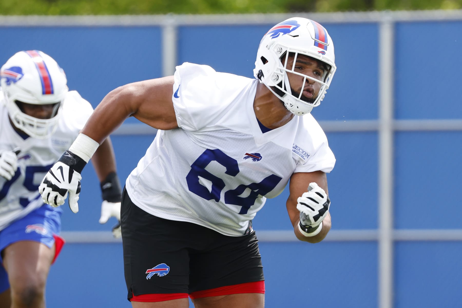 Buffalo Bills offensive lineman O'Cyrus Torrence (64) runs a drill during the NFL football team's rookie minicamp in Orchard Park, N.Y., Friday May 12, 2023. (AP Photo/Jeffrey T. Barnes)
