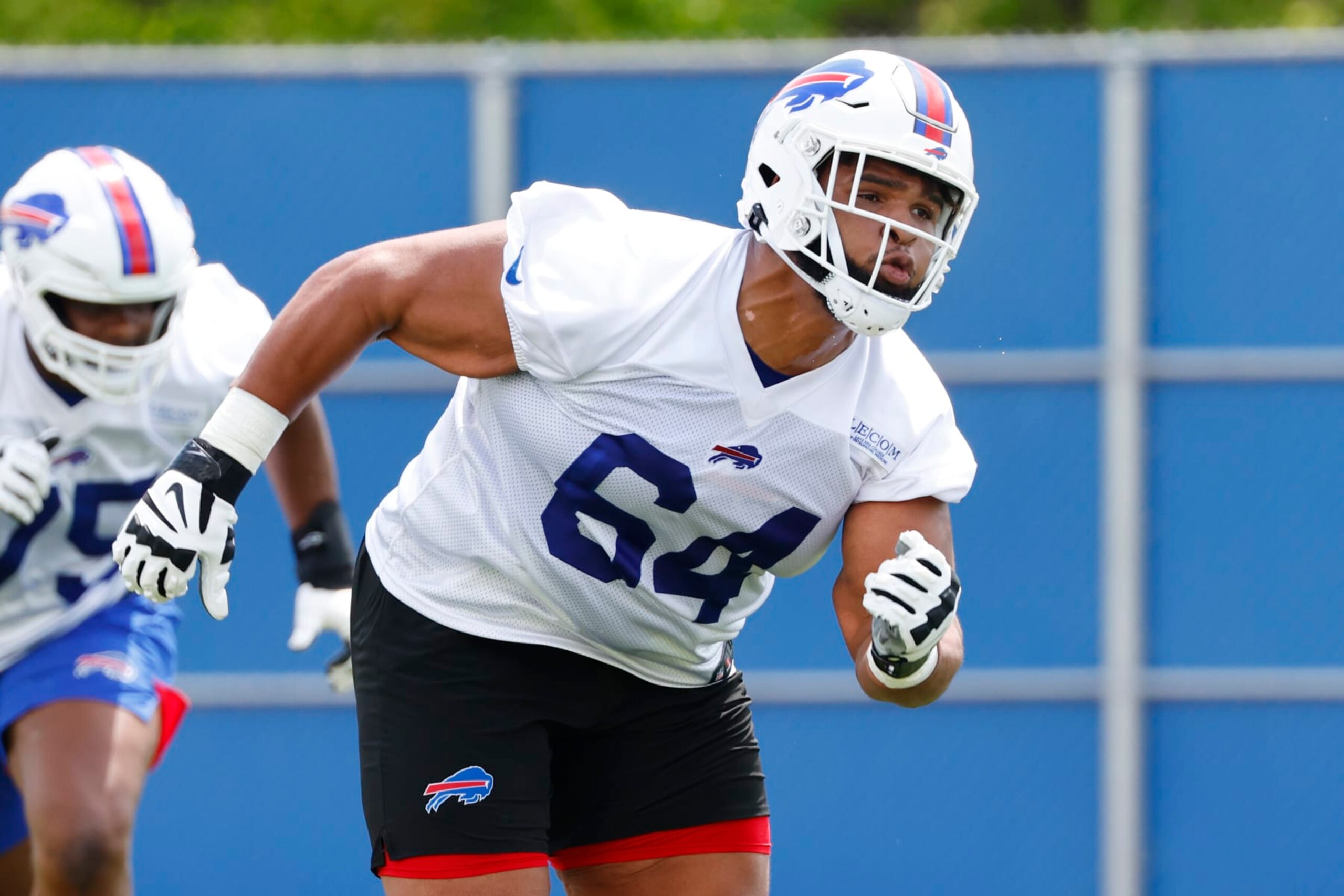 Buffalo Bills offensive lineman O'Cyrus Torrence (64) runs a drill during the NFL football team's rookie minicamp in Orchard Park, N.Y., Friday May 12, 2023. (AP Photo/Jeffrey T. Barnes) Buffalo Bills offensive lineman O'Cyrus Torrence (64) runs a drill during the NFL football team's rookie minicamp in Orchard Park, N.Y., Friday May 12, 2023. (AP Photo/Jeffrey T. Barnes)