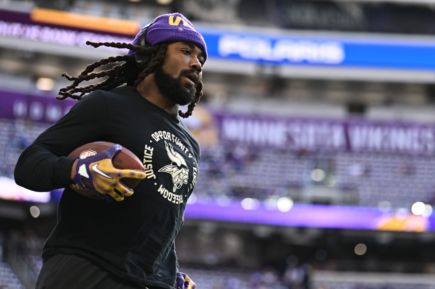 MINNEAPOLIS, MINNESOTA - JANUARY 15: Dalvin Cook #4 of the Minnesota Vikings warms up prior to the NFC Wild Card playoff game against the New York Giants at U.S. Bank Stadium on January 15, 2023 in Minneapolis, Minnesota. (Photo by Stephen Maturen/Getty Images)