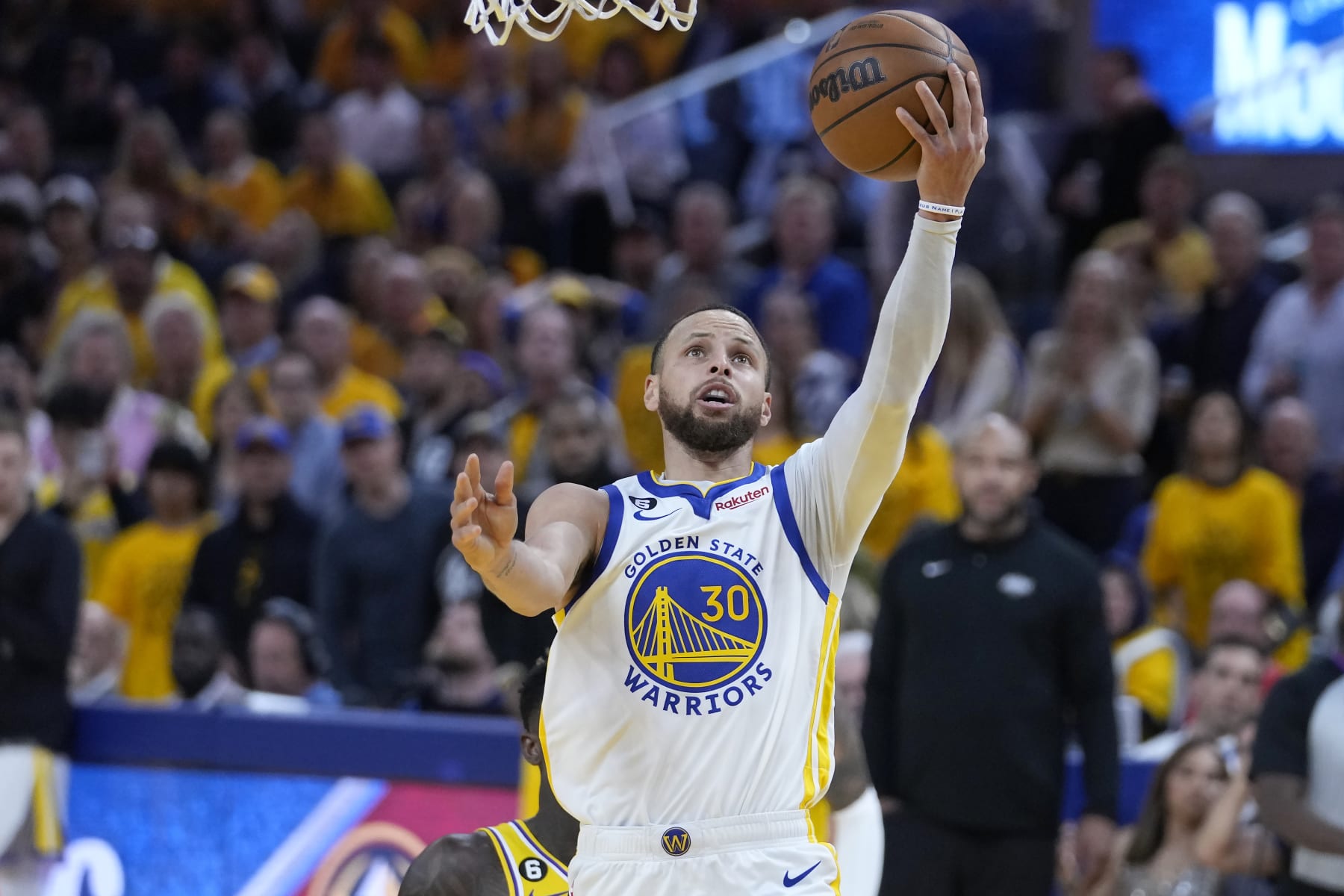 Golden State Warriors guard Stephen Curry shoots against the Los Angeles Lakers during the second half of Game 5 of an NBA basketball second-round playoff series Wednesday, May 10, 2023, in San Francisco. (AP Photo/Godofredo A. Vásquez)