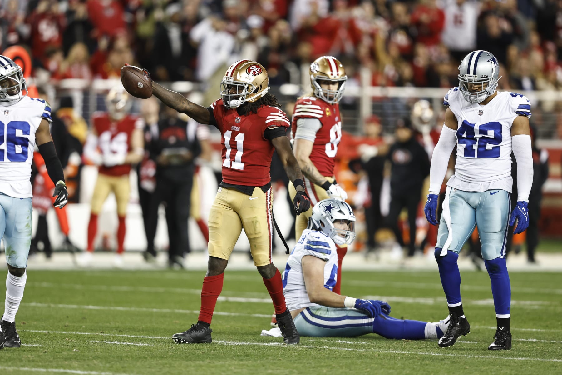 SANTA CLARA, CALIFORNIA - JANUARY 22: Brandon Aiyuk #11 of the San Francisco 49ers signals for a first down during an NFL divisional round playoff football game between the San Francisco 49ers and the Dallas Cowboys at Levi's Stadium on January 22, 2023 in Santa Clara, California. (Photo by Michael Owens/Getty Images)