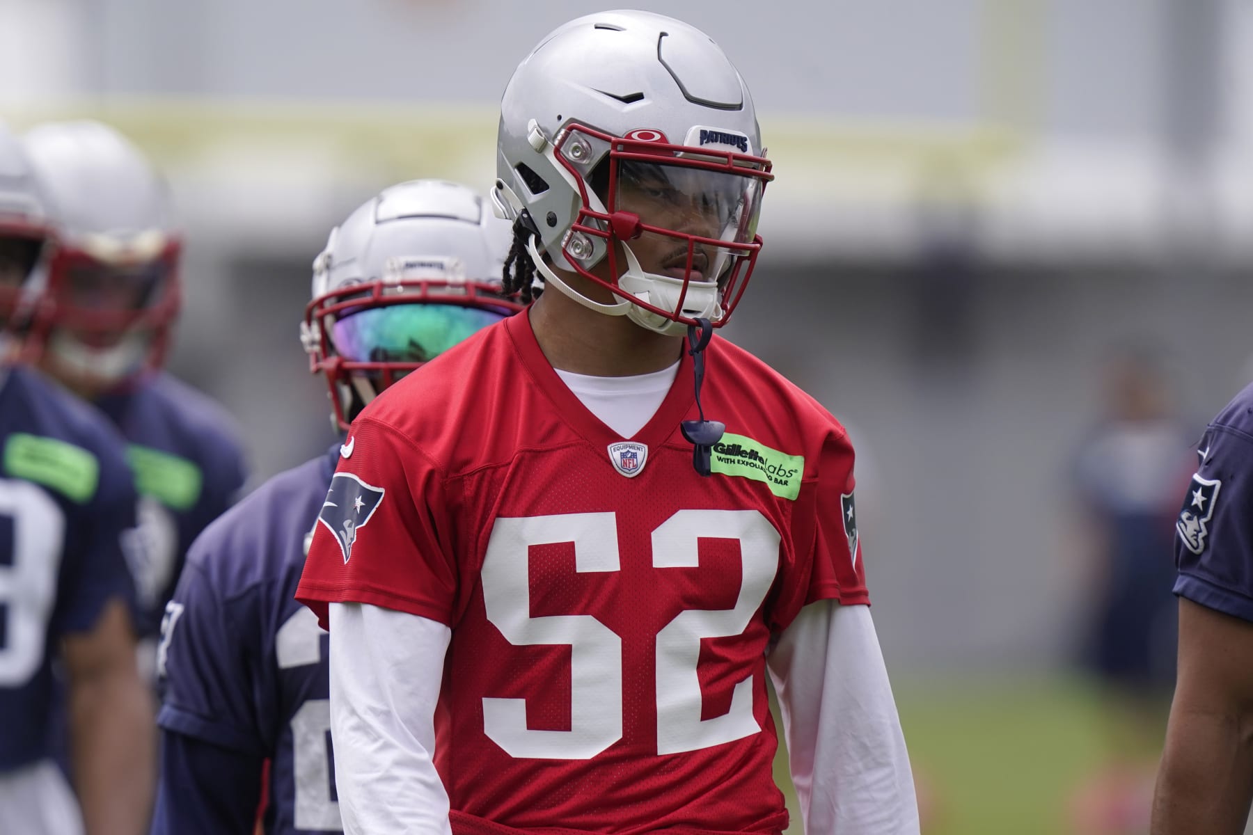 New England Patriots linebacker Marte Mapu (52) warms at the NFL football team's practice facility, Tuesday, June 13, 2023, in Foxborough, Mass. (AP Photo/Steven Senne)