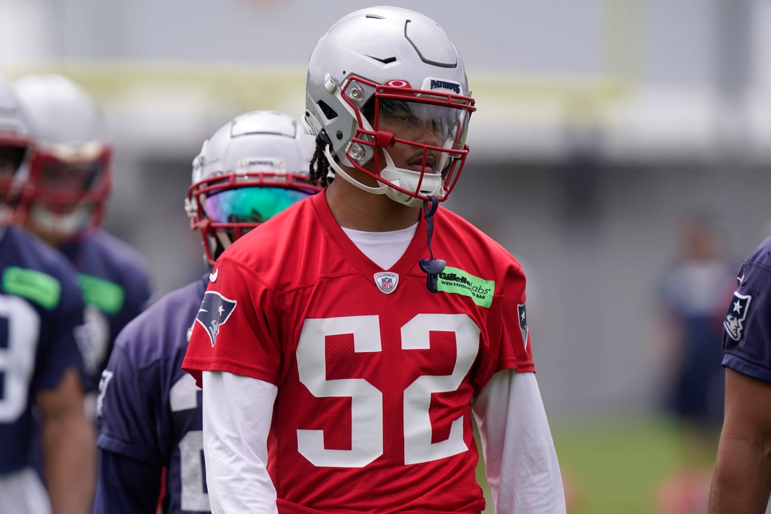 New England Patriots linebacker Marte Mapu (52) warms at the NFL football team's practice facility, Tuesday, June 13, 2023, in Foxborough, Mass. (AP Photo/Steven Senne) New England Patriots linebacker Marte Mapu (52) warms at the NFL football team's practice facility, Tuesday, June 13, 2023, in Foxborough, Mass. (AP Photo/Steven Senne)