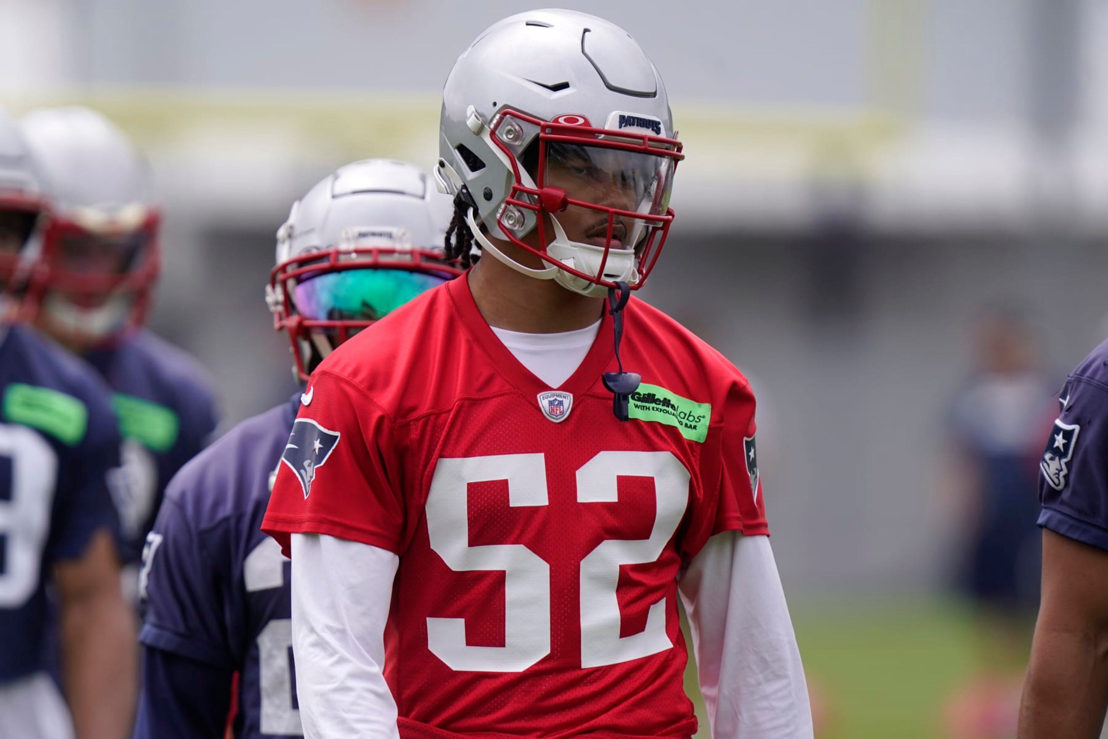 New England Patriots linebacker Marte Mapu (52) warms at the NFL football team's practice facility, Tuesday, June 13, 2023, in Foxborough, Mass. (AP Photo/Steven Senne) New England Patriots linebacker Marte Mapu (52) warms at the NFL football team's practice facility, Tuesday, June 13, 2023, in Foxborough, Mass. (AP Photo/Steven Senne)