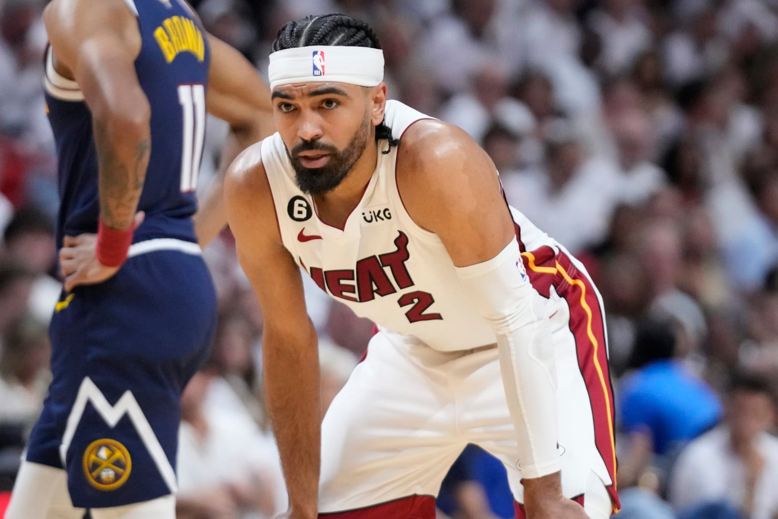 Miami Heat guard Gabe Vincent (2) waits for play to resume during the first half of Game 4 of the basketball NBA Finals against the Denver Nuggets, Friday, June 9, 2023, in Miami. (AP Photo/Wilfredo Lee)
