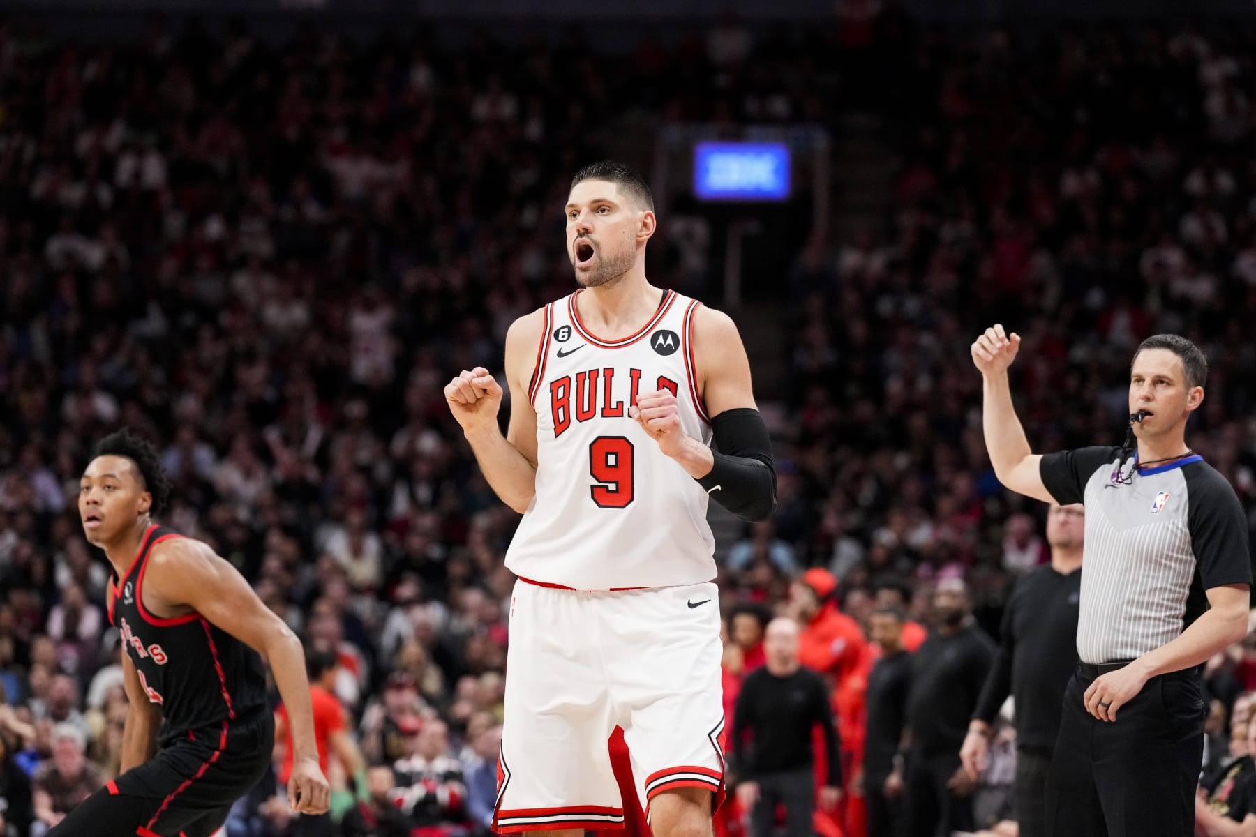 TORONTO, ON - APRIL 12: Nikola Vucevic #9 of the Chicago Bulls reacts against the Toronto Raptors during the 2023 Play-In Tournament at the Scotiabank Arena on April 12, 2023 in Toronto, Ontario, Canada. NOTE TO USER: User expressly acknowledges and agrees that, by downloading and/or using this Photograph, user is consenting to the terms and conditions of the Getty Images License Agreement. (Photo by Andrew Lahodynskyj/Getty Images)