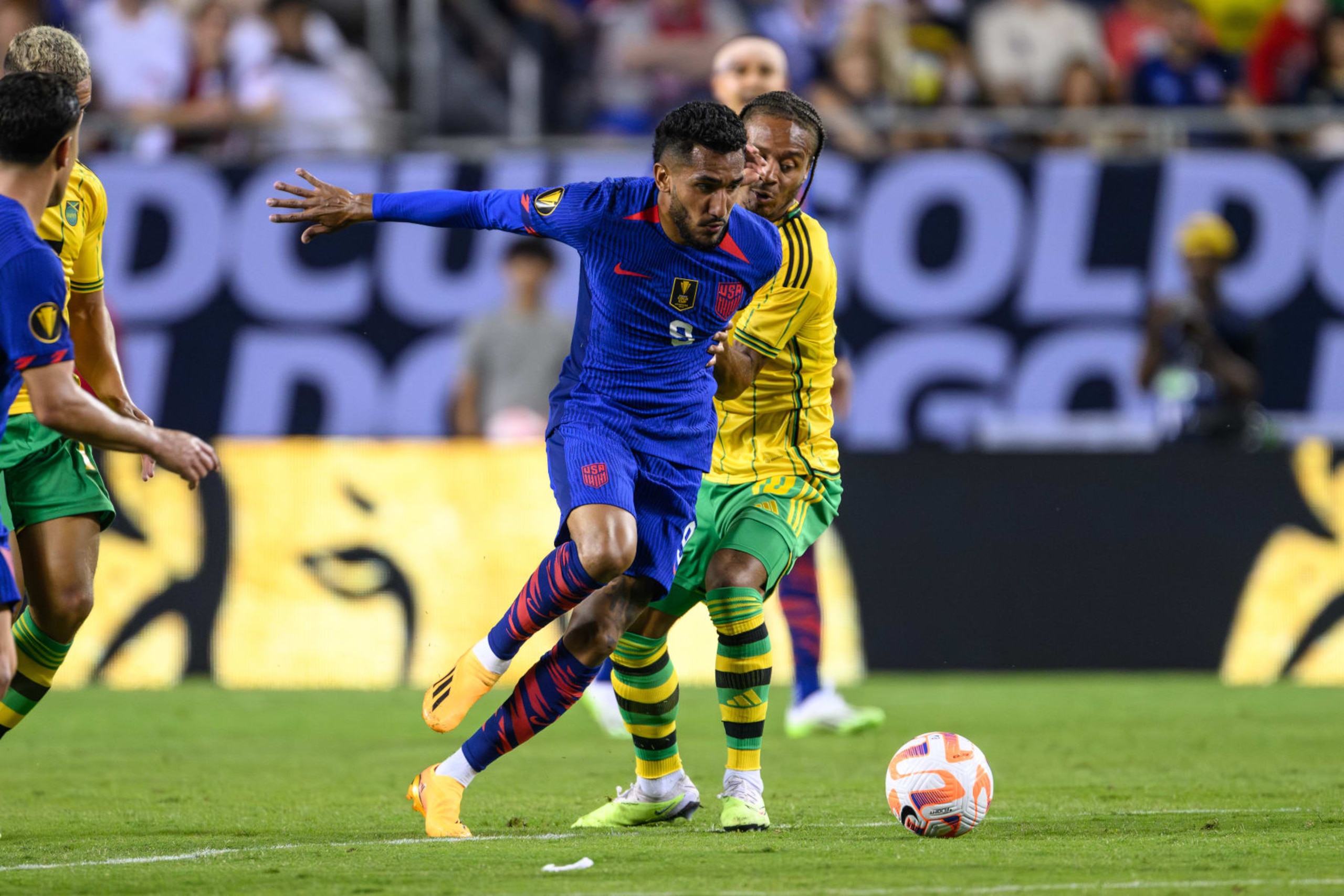 CHICAGO, IL - JUNE 24: Jesus Ferreira #9 of the United States plays the ball as Bobby Decordova-Reid #10 of Jamaica defends during a game between Jamaica and USMNT at Soldier Field on June 24, 2023 in Chicago, Illinois. (Photo by Daniel Bartel/ISI Photos/Getty Images) CHICAGO, IL - JUNE 24: Jesus Ferreira #9 of the United States plays the ball as Bobby Decordova-Reid #10 of Jamaica defends during a game between Jamaica and USMNT at Soldier Field on June 24, 2023 in Chicago, Illinois. (Photo by Daniel Bartel/ISI Photos/Getty Images)