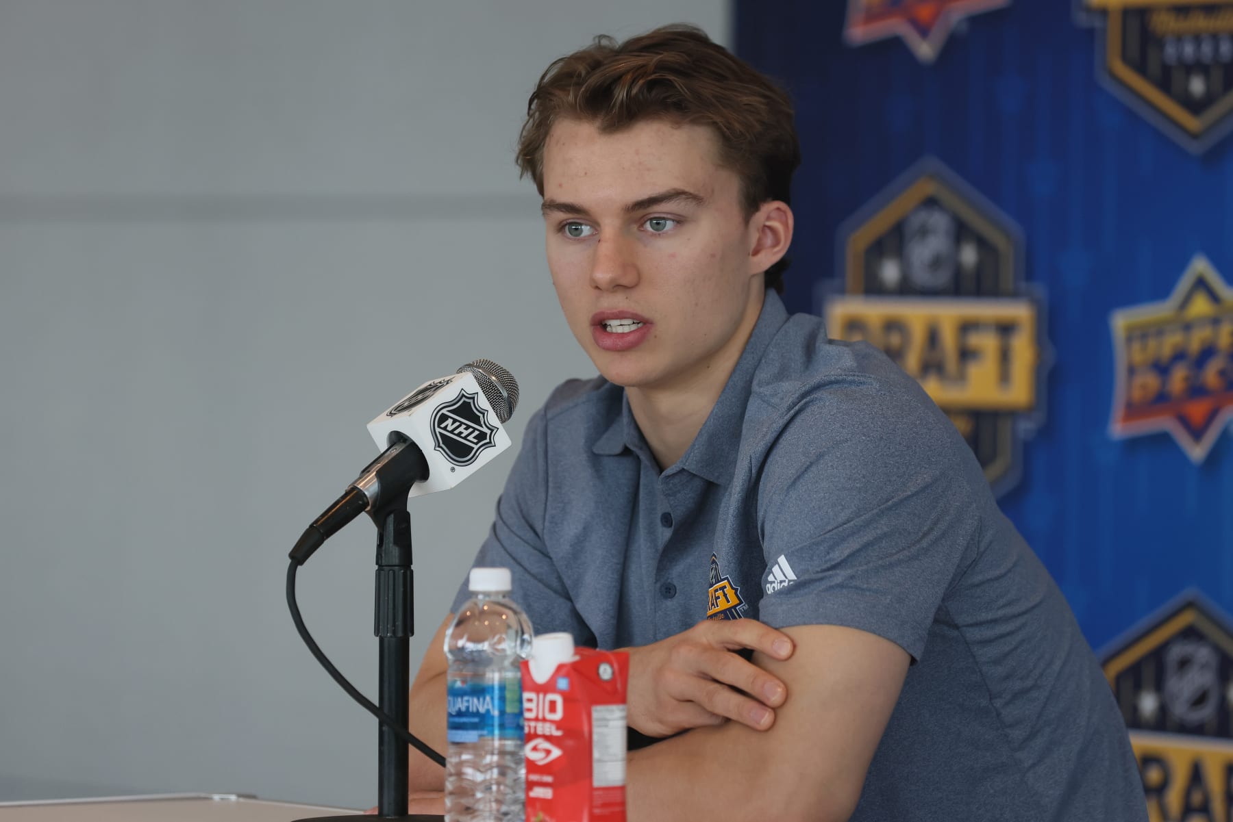 NASHVILLE, TENNESSEE - JUNE 27: NHL prospect Connor Bedard speaks with the media at a press availability at AllianceBernstein Tower on June 27, 2023 in Nashville, Tennessee. (Photo by Bruce Bennett/Getty Images)