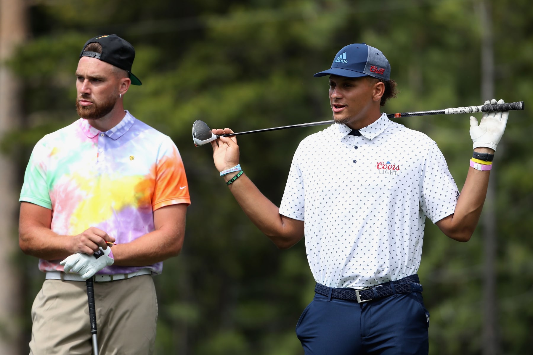 LAKE TAHOE, NEVADA - JULY 10: NFL athletes  Travis Kelce and Patrick Mahomes of the Kansas City Chiefs wait to tee off on the 18th hole during round one of the American Century Championship at Edgewood Tahoe South golf course on July 10, 2020 in Lake Tahoe, Nevada. (Photo by Christian Petersen/Getty Images)