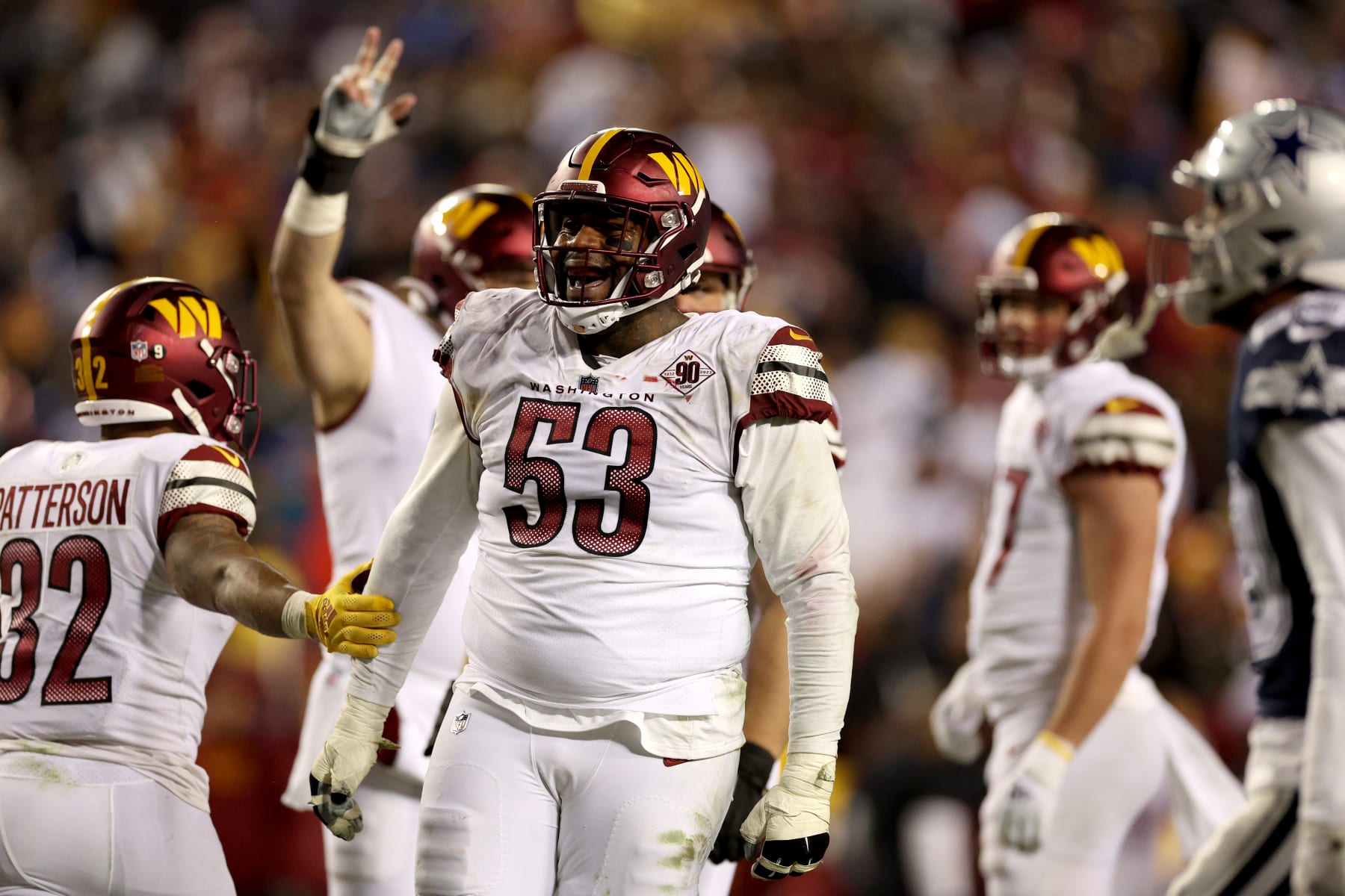 LANDOVER, MARYLAND - JANUARY 08: Guard Trai Turner #53 of the Washington Commanders looks on against the Dallas Cowboys at FedExField on January 08, 2023 in Landover, Maryland. (Photo by Rob Carr/Getty Images)