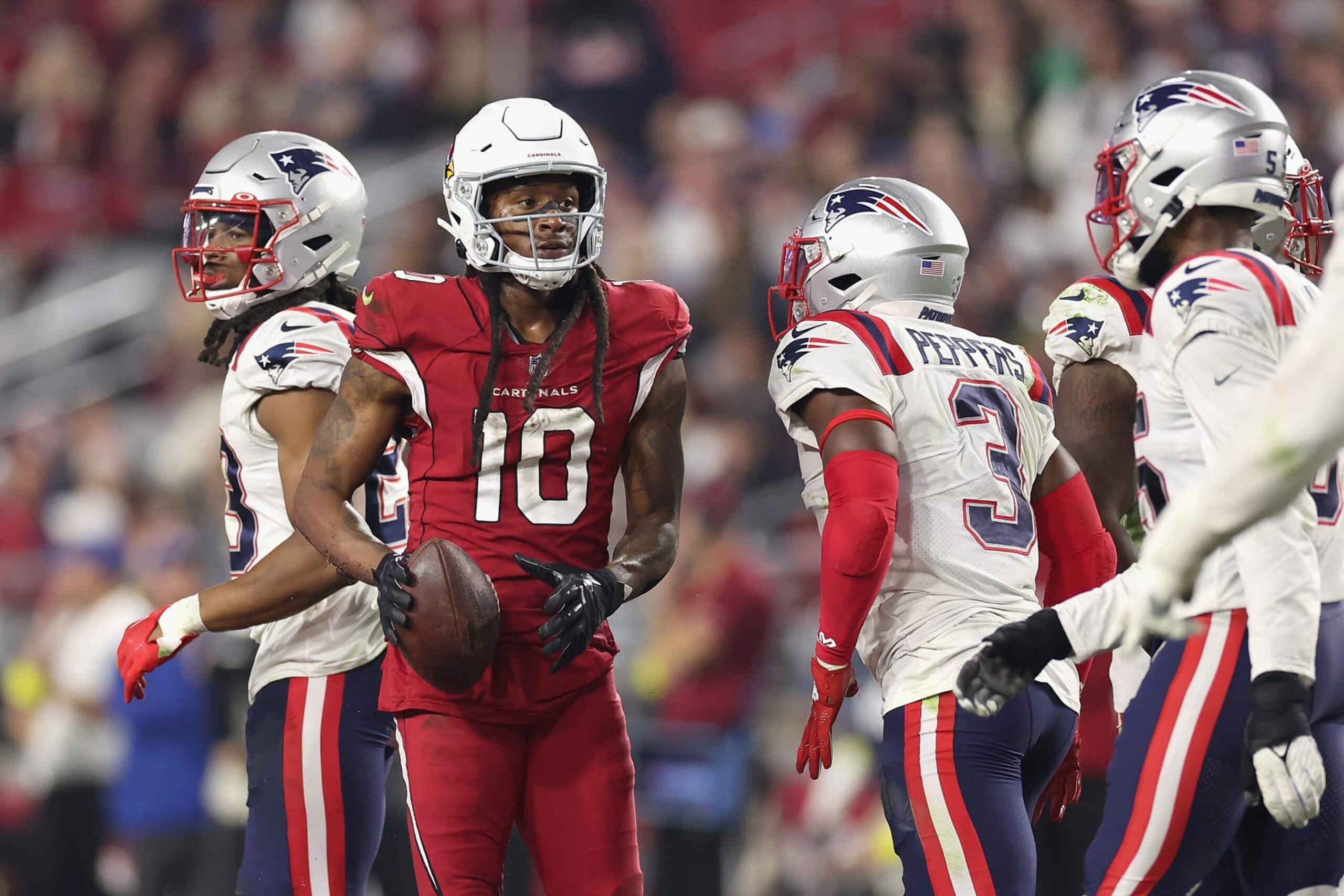 GLENDALE, ARIZONA - DECEMBER 12: Wide receiver DeAndre Hopkins #10 of the Arizona Cardinals after a reception against the New England Patriots during the NFL game at State Farm Stadium on December 12, 2022 in Glendale, Arizona. The Patriots defeated the Cardinals 27-13. (Photo by Christian Petersen/Getty Images) GLENDALE, ARIZONA - DECEMBER 12: Wide receiver DeAndre Hopkins #10 of the Arizona Cardinals after a reception against the New England Patriots during the NFL game at State Farm Stadium on December 12, 2022 in Glendale, Arizona. The Patriots defeated the Cardinals 27-13. (Photo by Christian Petersen/Getty Images)
