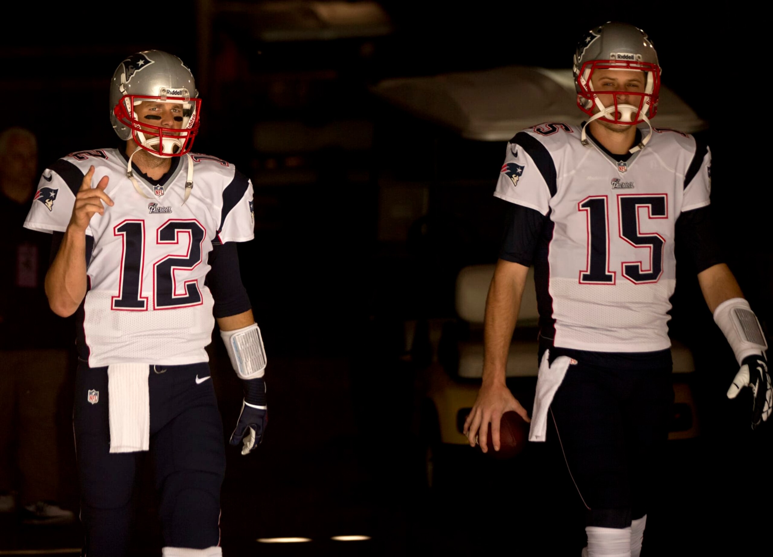 EAST RUTHERFORD, NJ - OCTOBER 20: New England Patriots quarterback Tom Brady and teammate Ryan Mallett walk out of the tunnel before they play the New York Jets at MetLife Stadium on Sunday, Oct. 20, 2013. (Photo by Matthew J. Lee/The Boston Globe via Getty Images)