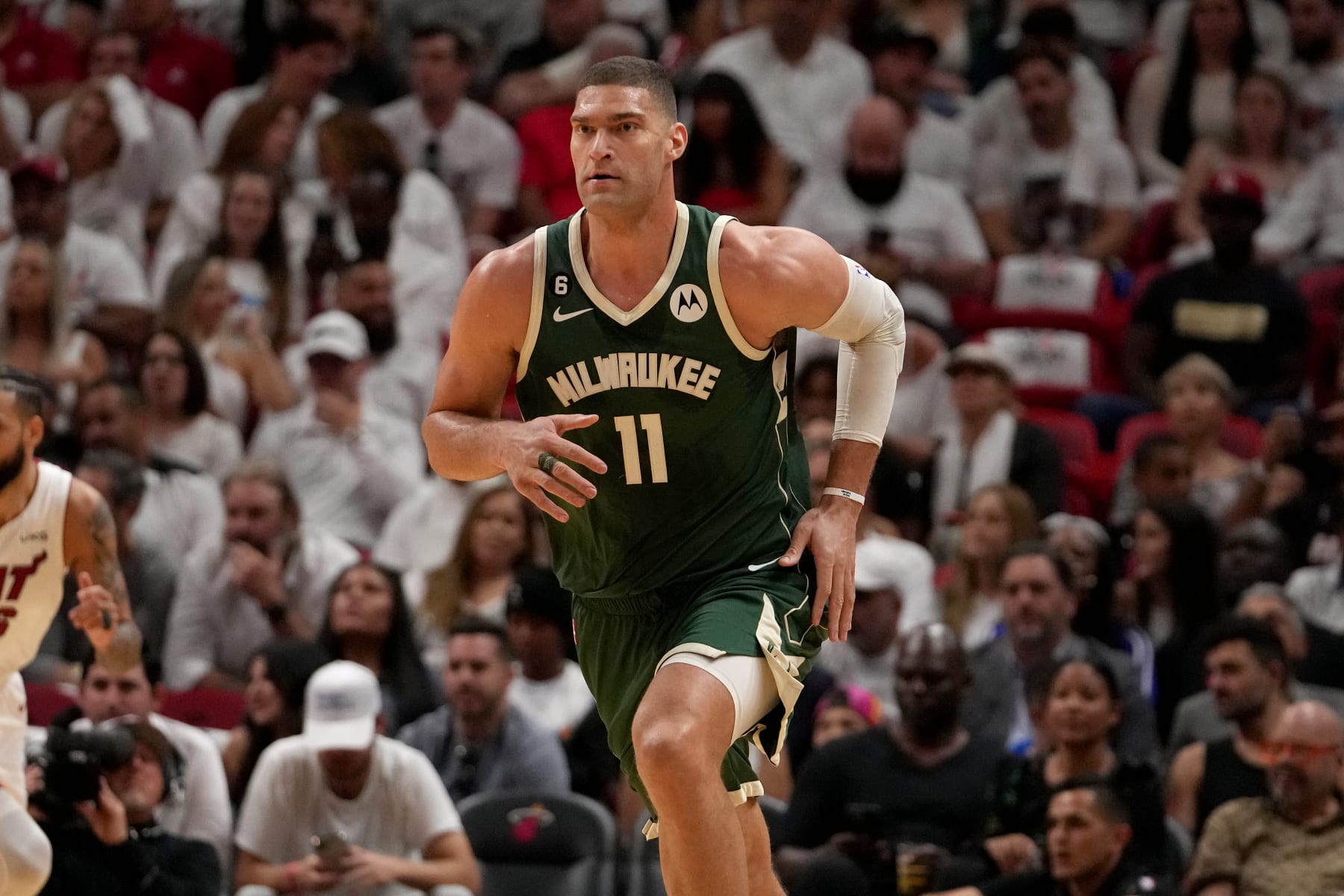 MIAMI, FL - APRIL 22: Brook Lopez #11 of the Milwaukee Bucks looks on during the game against the Miami Heat during Round One Game Three of the 2023 NBA Playoffs on April 22, 2023 at Kaseya Center in Miami, Florida. NOTE TO USER: User expressly acknowledges and agrees that, by downloading and or using this Photograph, user is consenting to the terms and conditions of the Getty Images License Agreement. Mandatory Copyright Notice: Copyright 2023 NBAE (Photo by Eric Espada/NBAE via Getty Images)
