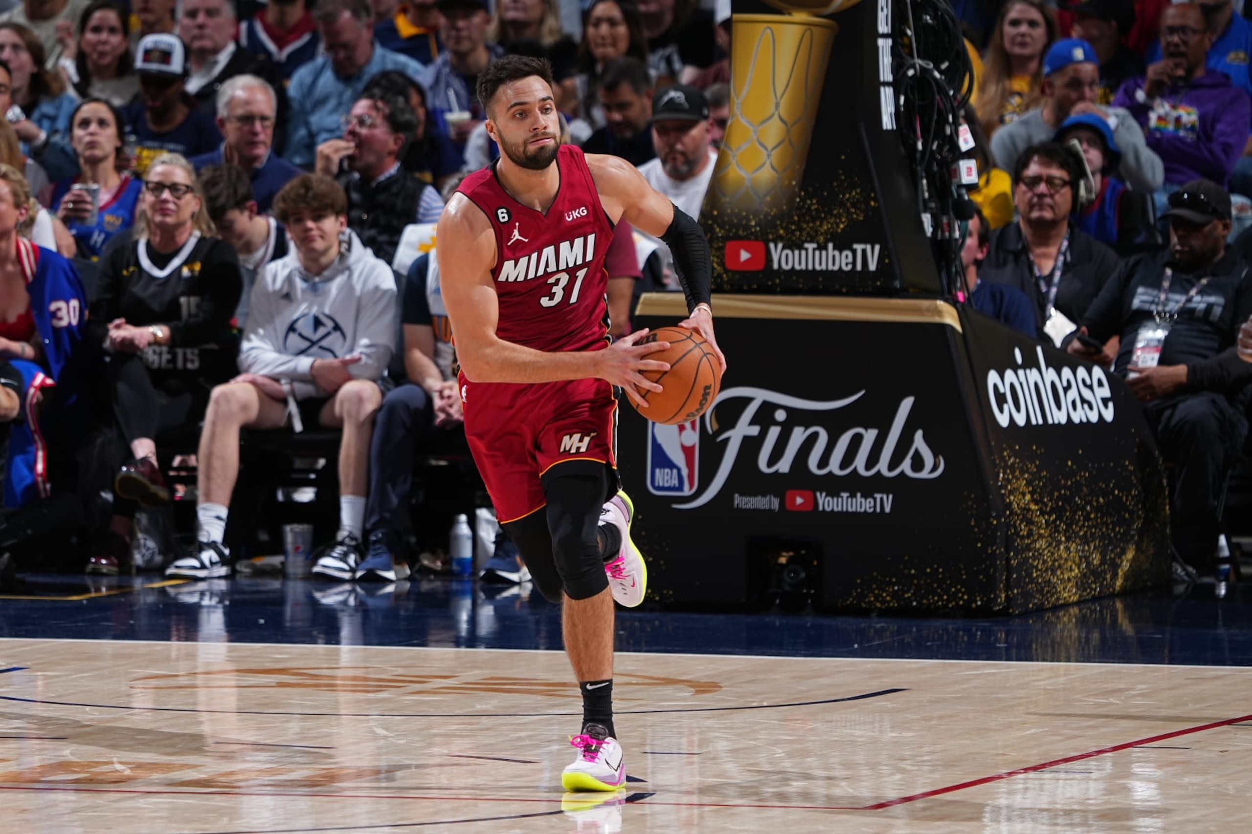 DENVER, CO - JUNE 12: Max Strus #31 of the Miami Heat looks to pass the ball against the Denver Nuggets during Game Five of the 2023 NBA Finals on June 12, 2023 at Ball Arena in Denver, Colorado. NOTE TO USER: User expressly acknowledges and agrees that, by downloading and or using this Photograph, user is consenting to the terms and conditions of the Getty Images License Agreement. Mandatory Copyright Notice: Copyright 2023 NBAE (Photo by Garrett Ellwood/NBAE via Getty Images)
