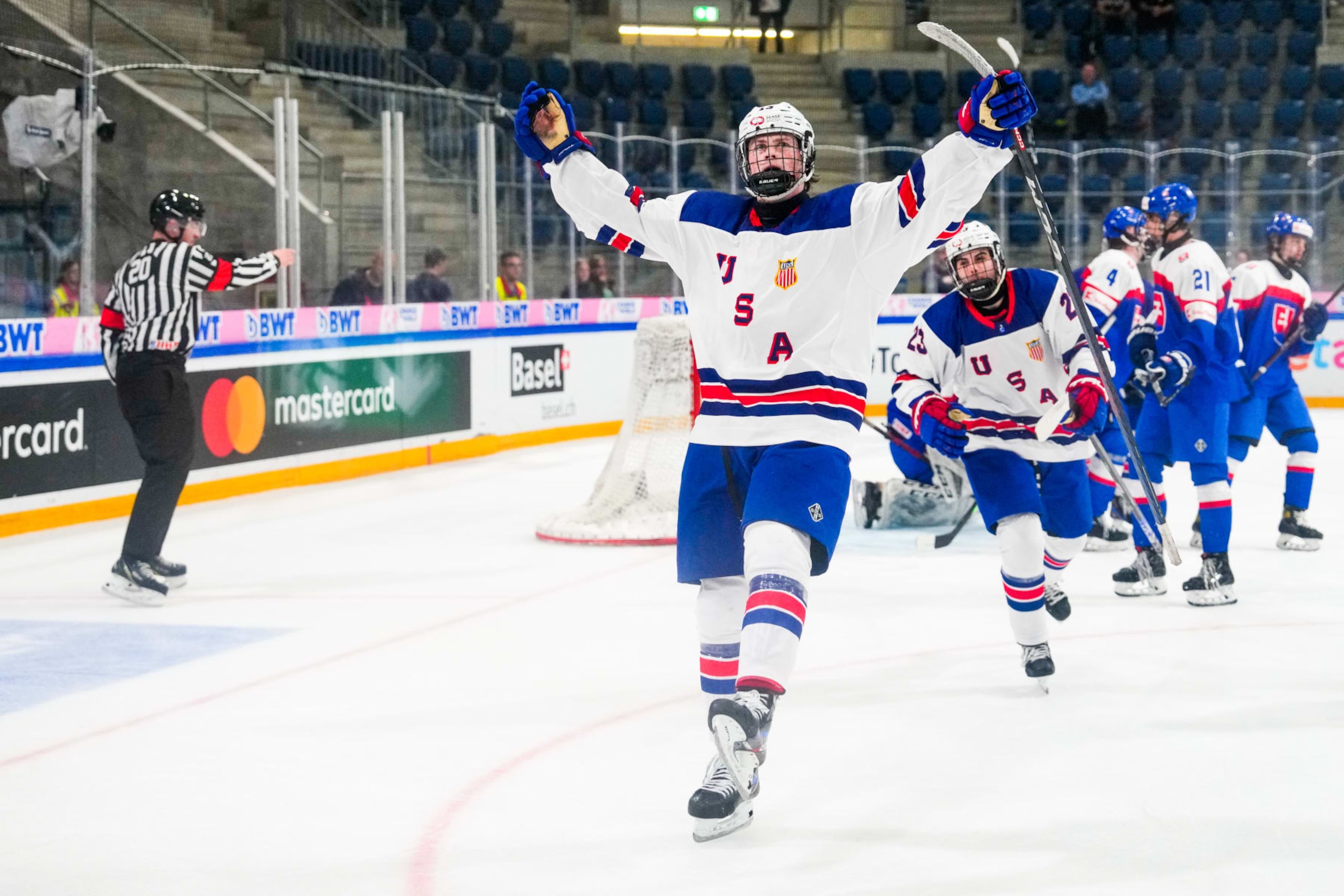 BASEL, SWITZERLAND - APRIL 29: Danny Nelson of United States (L) celebrates his goal during the semi final of U18 Ice Hockey World Championship match between United States and Slovakia at St. Jakob-Park on April 29, 2023 in Basel, Switzerland. (Photo by Jari Pestelacci/Eurasia Sport Images/Getty Images)