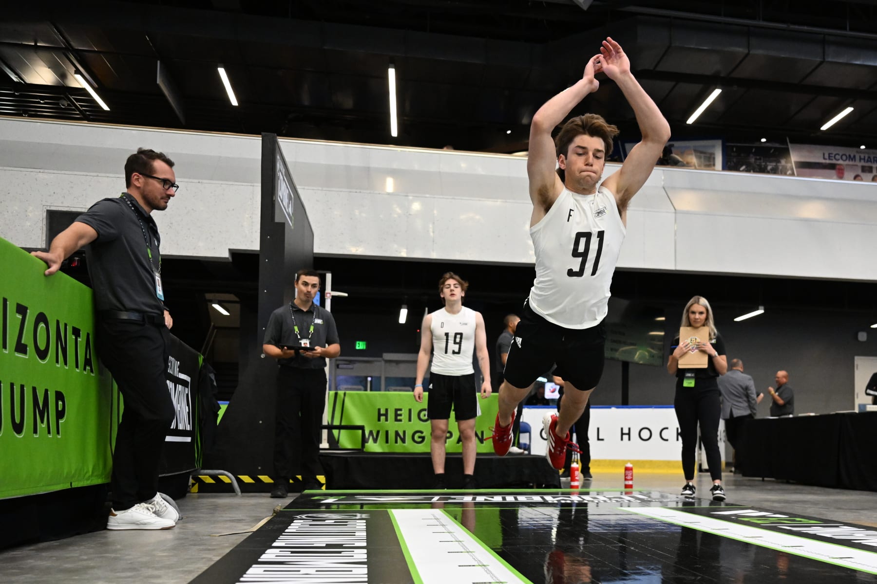 BUFFALO, NEW YORK - JUNE 10: Jayden Perron #91 performs the standing horizontal jump during the 2023 NHL Scouting Combine at the LECOM Harborcenter on June 10, 2023 in Buffalo, New York. (Photo by Joe Hrycych/NHLI via Getty Images)