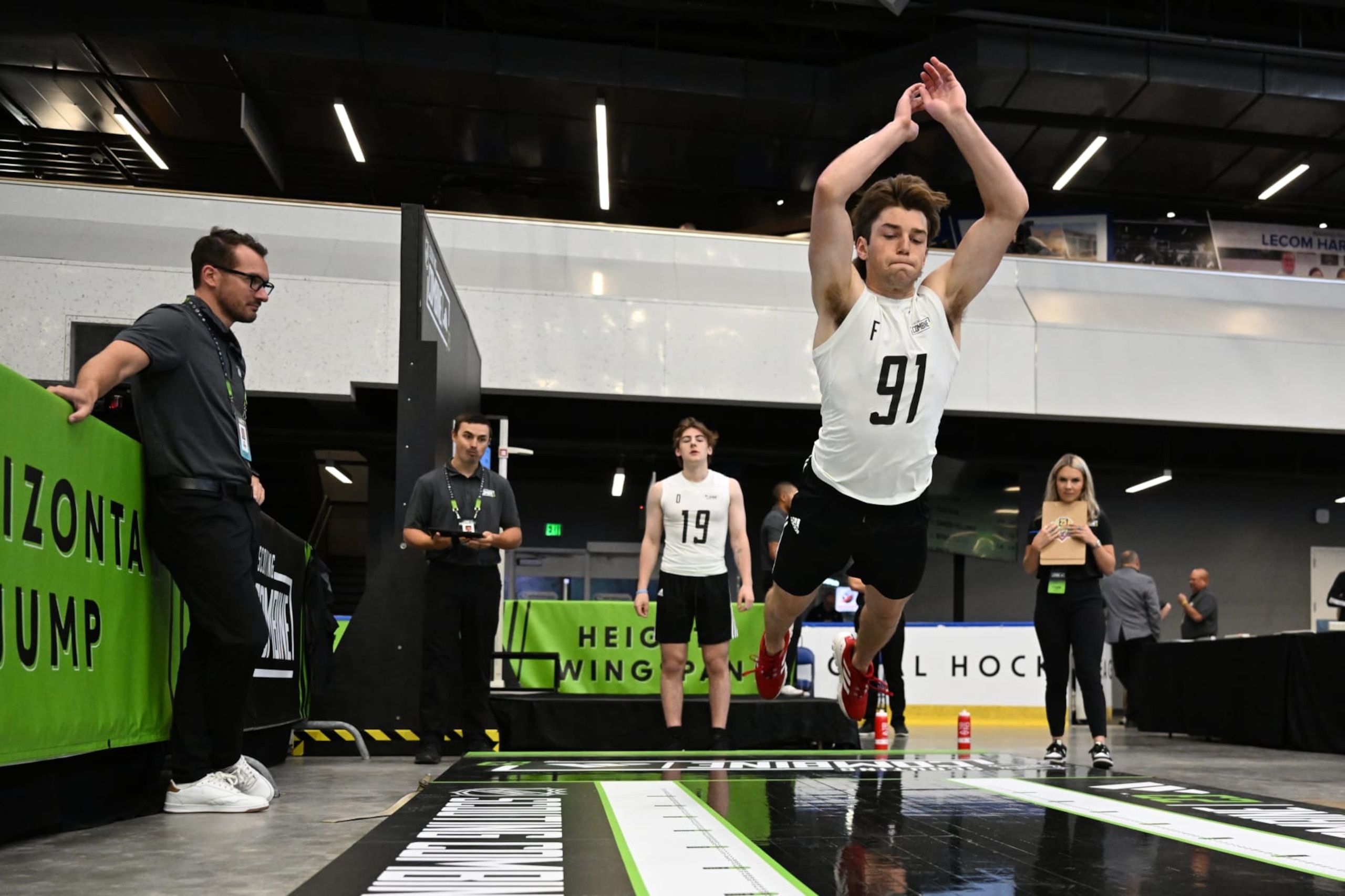 BUFFALO, NEW YORK - JUNE 10: Jayden Perron #91 performs the standing horizontal jump during the 2023 NHL Scouting Combine at the LECOM Harborcenter on June 10, 2023 in Buffalo, New York. (Photo by Joe Hrycych/NHLI via Getty Images)