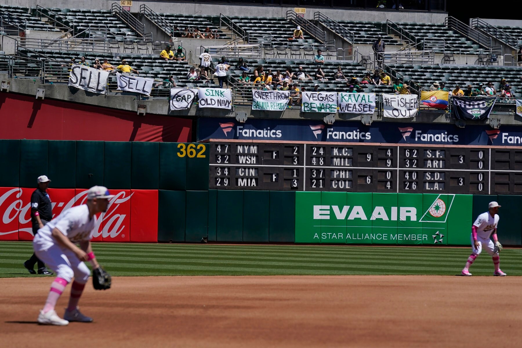 Signs in the Oakland Coliseum bleachers, May 2023.