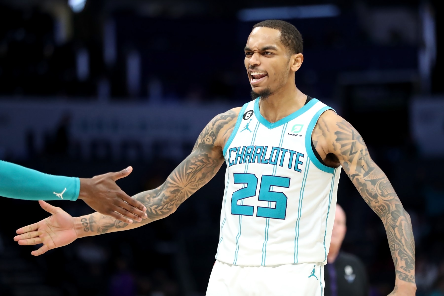 CHARLOTTE, NORTH CAROLINA - FEBRUARY 13: P.J. Washington #25 of the Charlotte Hornets celebrates after hitting a three pointer during the fourth period of a basketball game at Spectrum Center on February 13, 2023 in Charlotte, North Carolina. NOTE TO USER: User expressly acknowledges and agrees that, by downloading and or using this photograph, User is consenting to the terms and conditions of the Getty Images License Agreement. (Photo by David Jensen/Getty Images)
