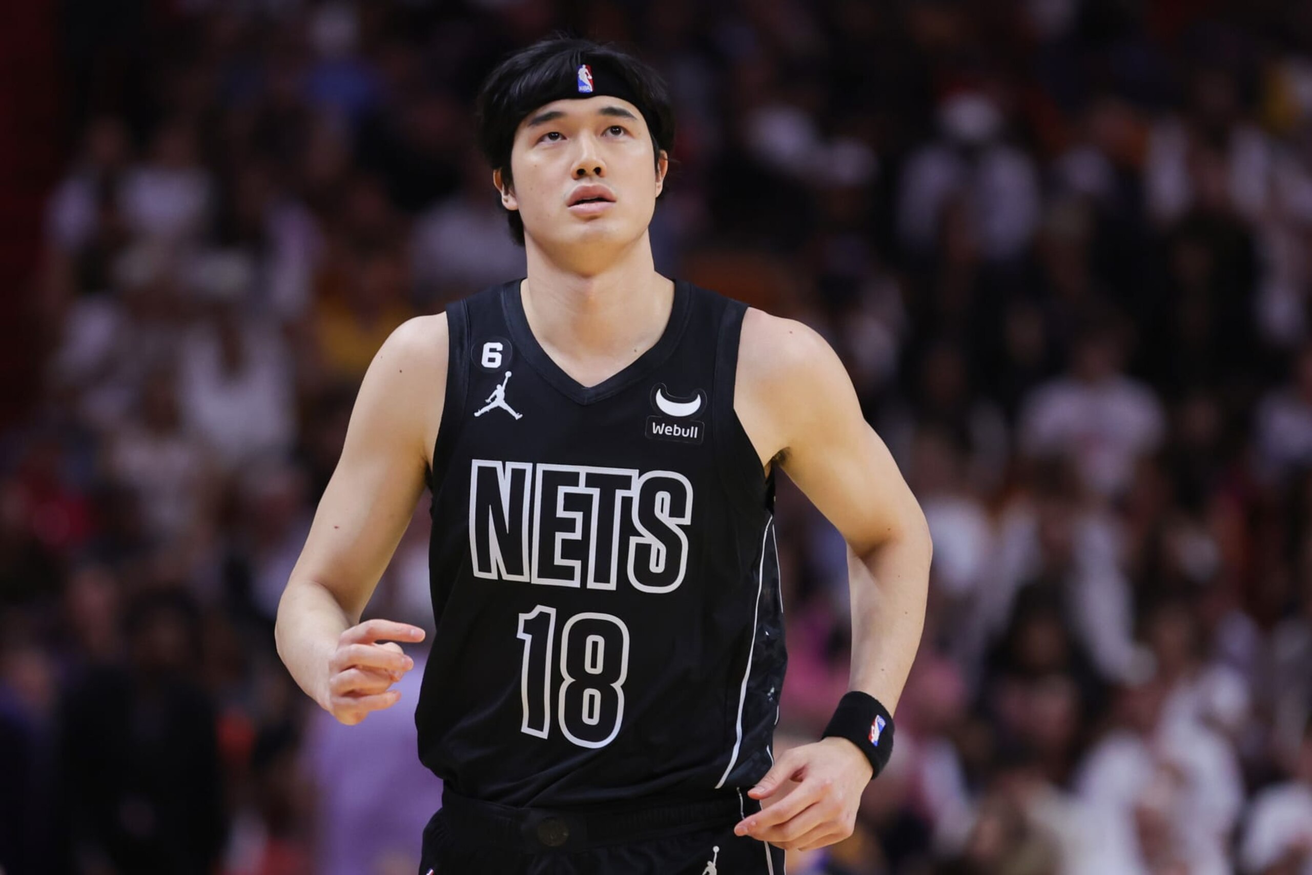 MIAMI, FLORIDA - MARCH 25: Yuta Watanabe #18 of the Brooklyn Nets looks on against the Miami Heat during the first quarter at Miami-Dade Arena on March 25, 2023 in Miami, Florida. NOTE TO USER: User expressly acknowledges and agrees that, by downloading and or using this photograph, User is consenting to the terms and conditions of the Getty Images License Agreement. (Photo by Megan Briggs/Getty Images) MIAMI, FLORIDA - MARCH 25: Yuta Watanabe #18 of the Brooklyn Nets looks on against the Miami Heat during the first quarter at Miami-Dade Arena on March 25, 2023 in Miami, Florida. NOTE TO USER: User expressly acknowledges and agrees that, by downloading and or using this photograph, User is consenting to the terms and conditions of the Getty Images License Agreement. (Photo by Megan Briggs/Getty Images)