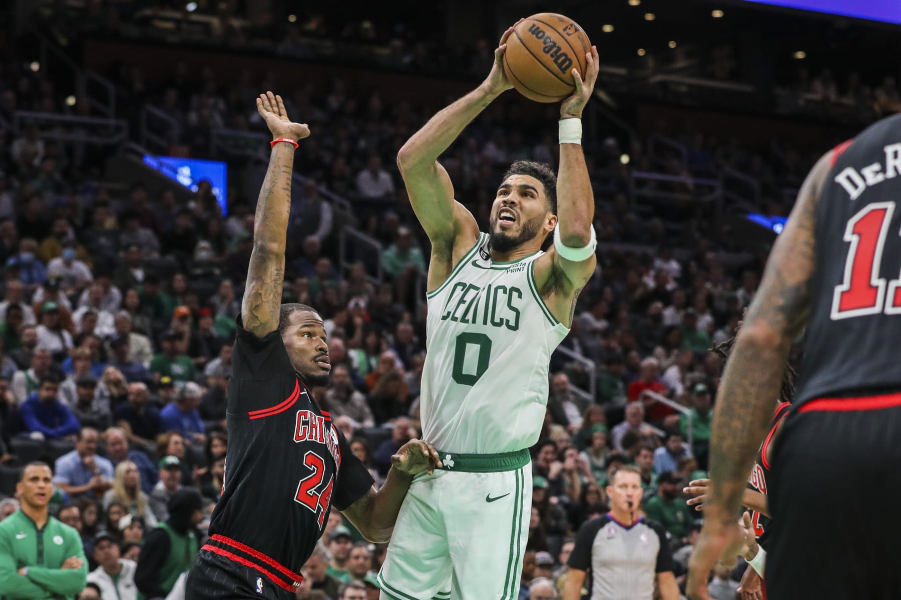 Boston, MA - November 4: Boston Celtics SF Jayson Tatum tries to shoot the ball while Chicago Bulls SF Javonte Green keeps a hand on his hip. The Celtics beat the Chicago Bulls 123-119. (Photo by Erin Clark/The Boston Globe via Getty Images)