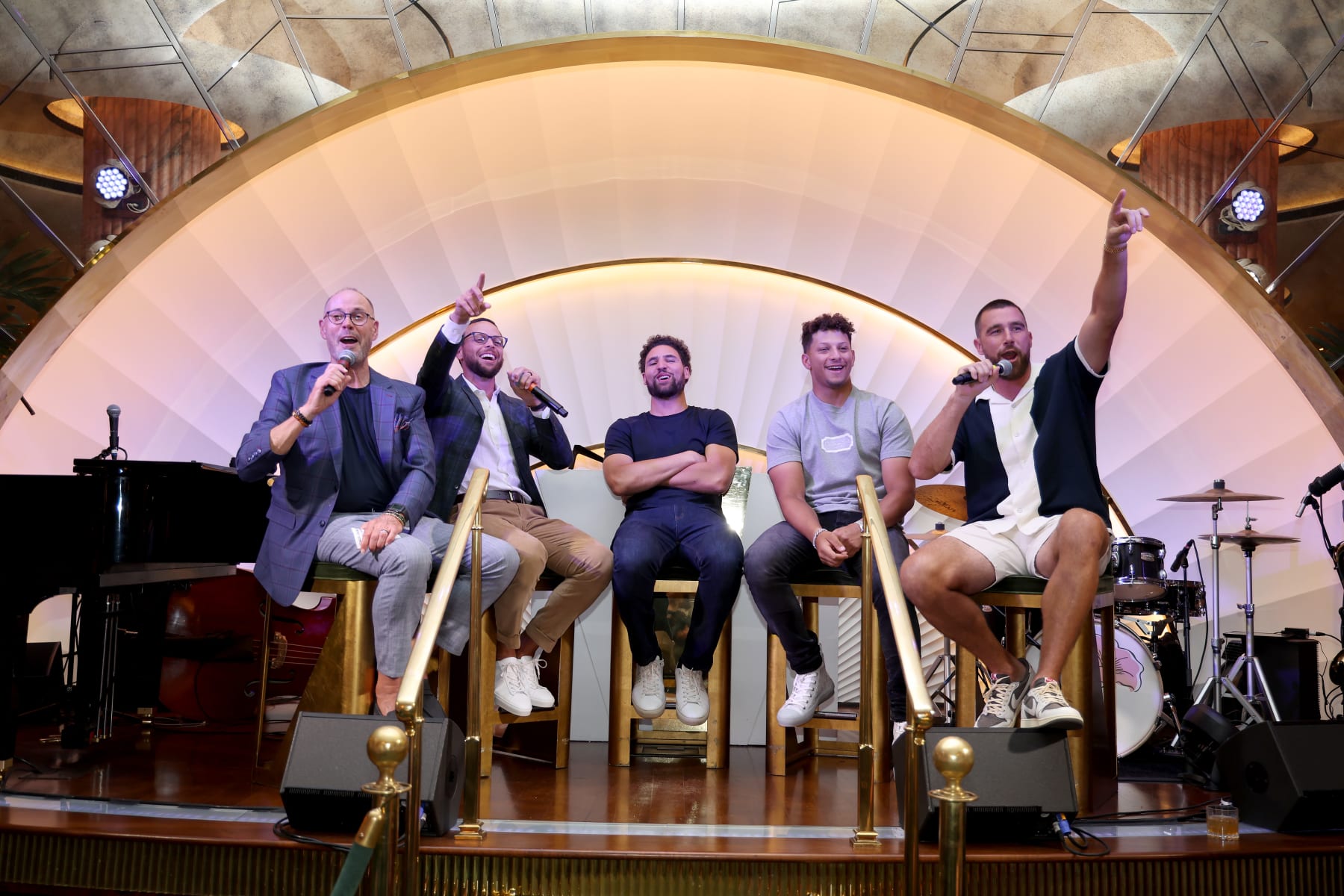 LAS VEGAS, NEVADA - JUNE 28: (L-R) TNT commentator Ernie Johnson speaks with Stephen Curry and Klay Thompson of the Golden State Warriors and Patrick Mahomes and Travis Kelce of the Kansas City Chiefs at a welcome reception for Capital One's The Match VII at Wynn Golf Club on June 28, 2023 in Las Vegas, Nevada. (Photo by Ezra Shaw/Getty Images for The Match)