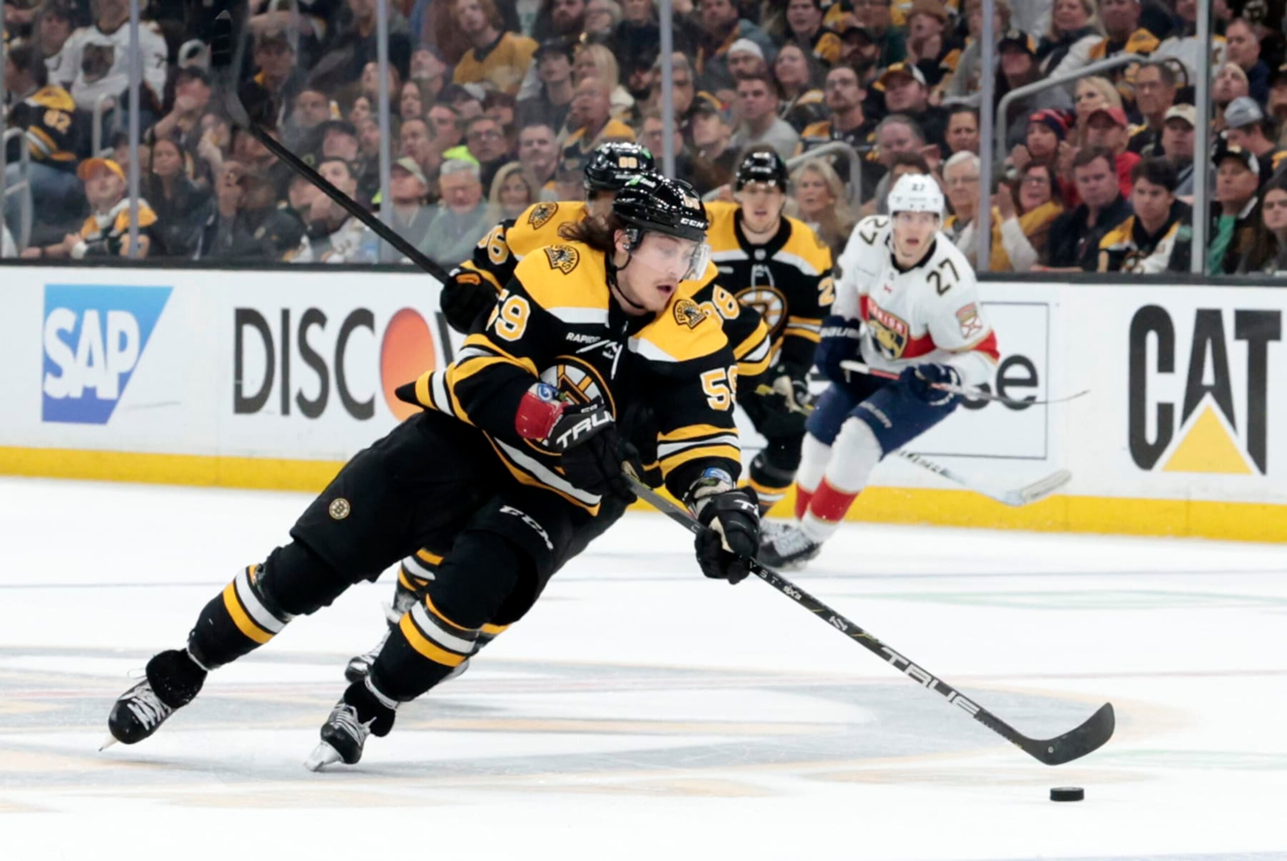 BOSTON, MA - APRIL 26: Boston Bruins right wing Tyler Bertuzzi (59) carries the puck during Game 5 of an Eastern Conference First Round playoff contest between the Boston Bruins and the Florida Panthers on April 26, 2023, at TD Garden in Boston, Massachusetts.(Photo by Fred Kfoury III/Icon Sportswire via Getty Images)