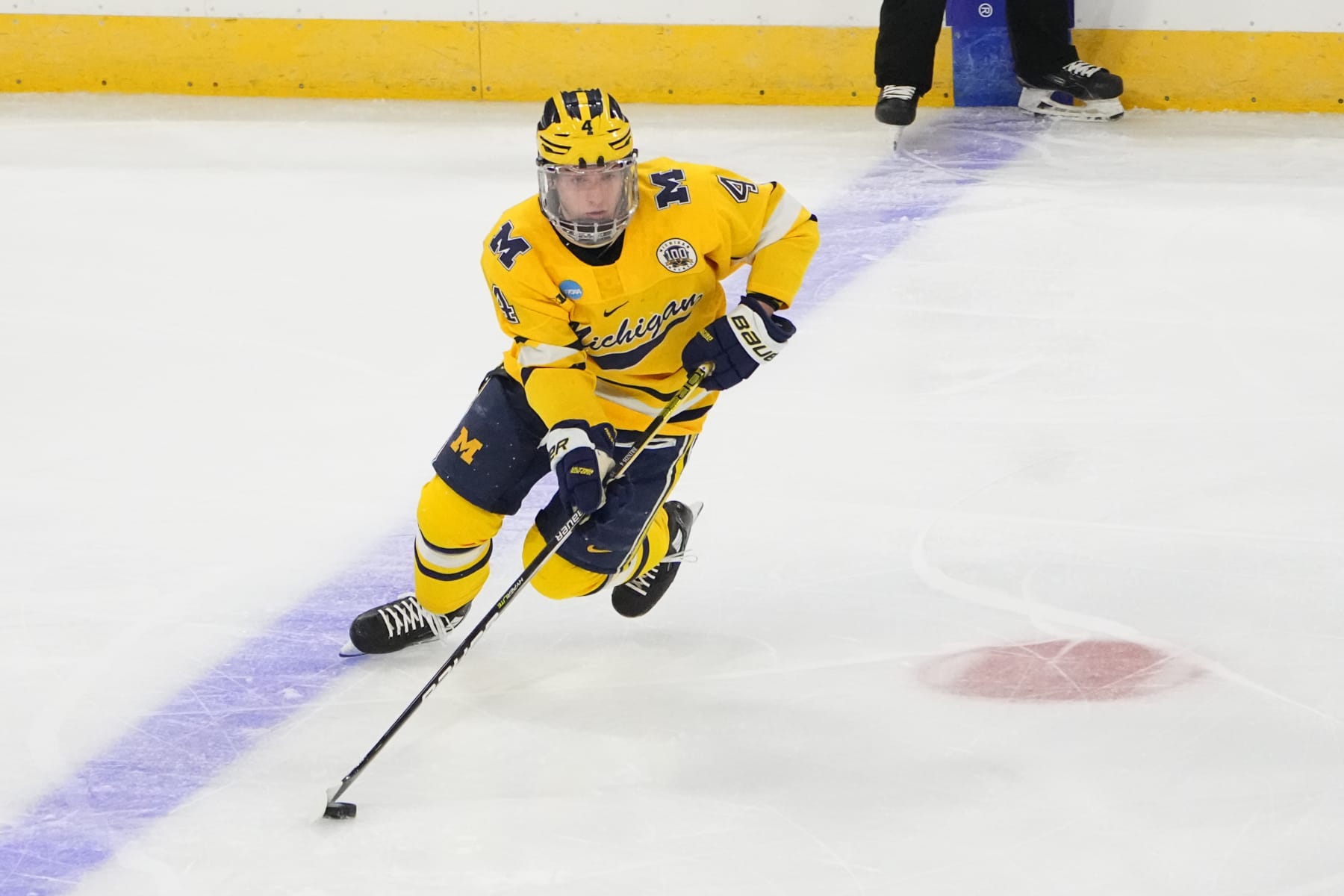 ALLENTOWN, PA - MARCH 26: Michigan Wolverines Forward Gavin Brindley (4) skates with the puck during the first period of the 2023 NCAA Division I Mens Ice Hockey Regional Final between the Penn State Nittany Lions and the Michigan Wolverines on March 26, 2023, at the PPL Center in Allentown, PA. (Photo by Gregory Fisher/Icon Sportswire via Getty Images)