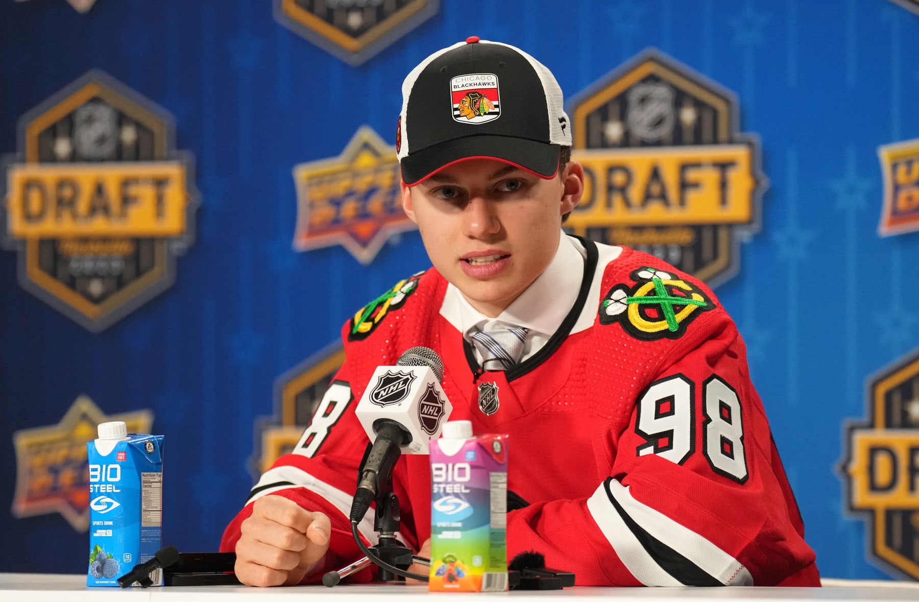 NASHVILLE, TENNESSEE - JUNE 28: Connor Bedard speaks during an interview after being selected first overall by the Chicago Blackhawks during the 2023 Upper Deck NHL Draft - Round One at Bridgestone Arena on June 28, 2023 in Nashville, Tennessee. (Photo by John Russell/NHLI via Getty Images)