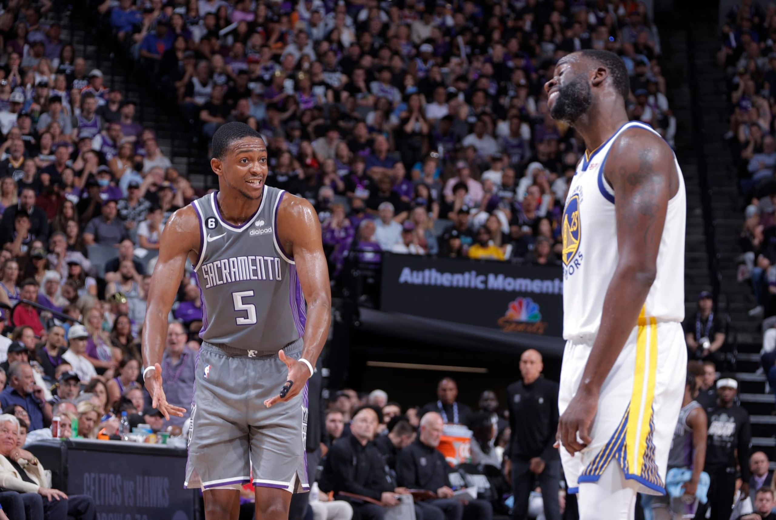 De'Aaron Fox and Draymond Green De'Aaron Fox and Draymond Green