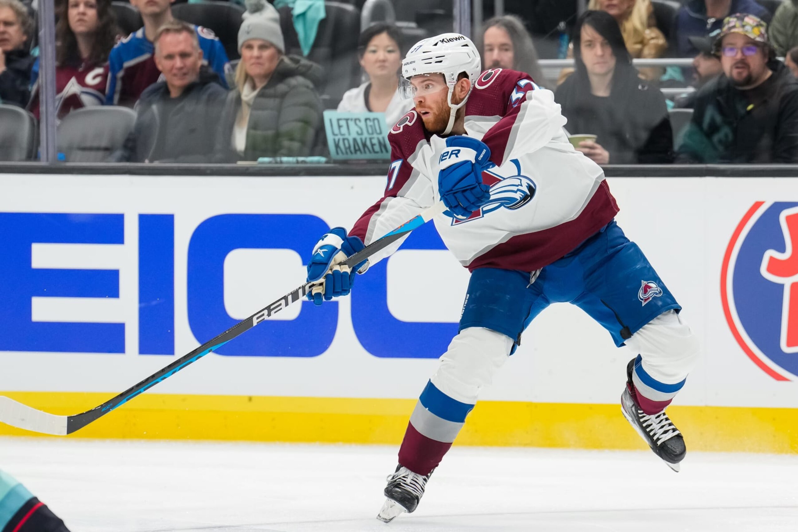 SEATTLE, WASHINGTON - APRIL 22: J.T. Compher #37 of the Colorado Avalanche passes the puck during the second period against the Seattle Kraken in Game Three of the First Round of the 2023 Stanley Cup Playoffs at Climate Pledge Arena on April 22, 2023 in Seattle, Washington. (Photo by Christopher Mast/2023 NHLI)