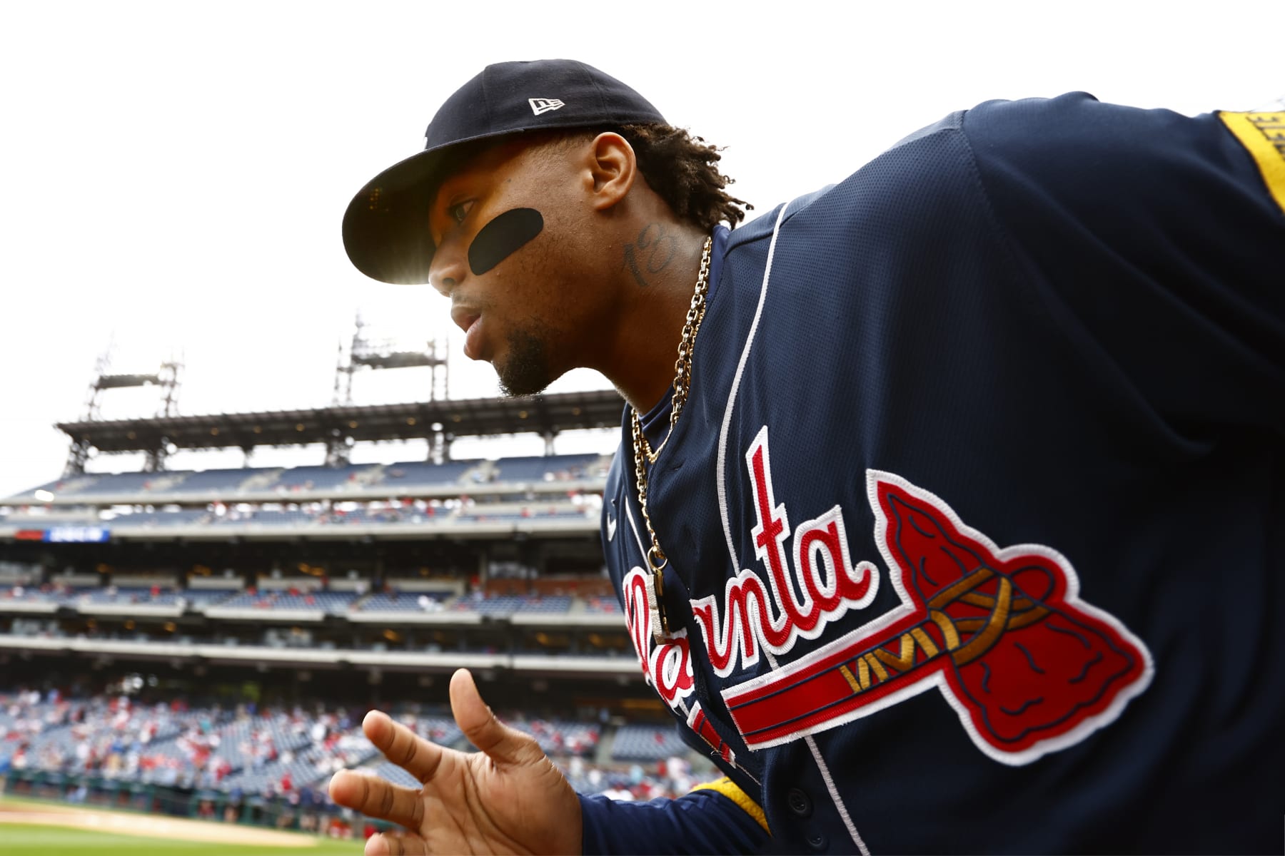 PHILADELPHIA, PENNSYLVANIA - JUNE 22: Ronald Acuna Jr. #13 of the Atlanta Braves runs onto the field before the start of their game against the Philadelphia Phillies of a game at Citizens Bank Park on June 22, 2023 in Philadelphia, Pennsylvania. (Photo by Rich Schultz/Getty Images)