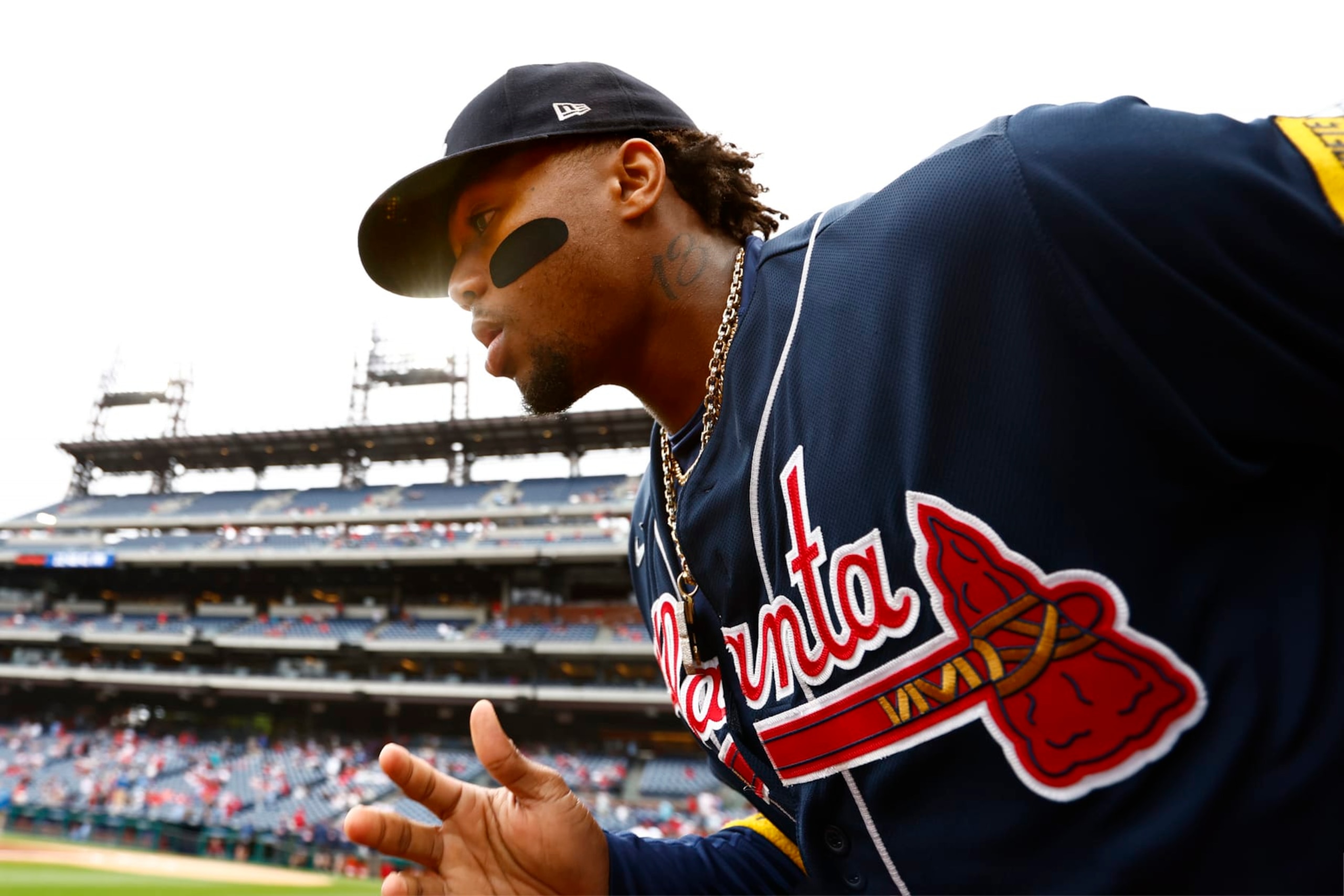 PHILADELPHIA, PENNSYLVANIA - JUNE 22: Ronald Acuna Jr. #13 of the Atlanta Braves runs onto the field before the start of their game against the Philadelphia Phillies of a game at Citizens Bank Park on June 22, 2023 in Philadelphia, Pennsylvania. (Photo by Rich Schultz/Getty Images)