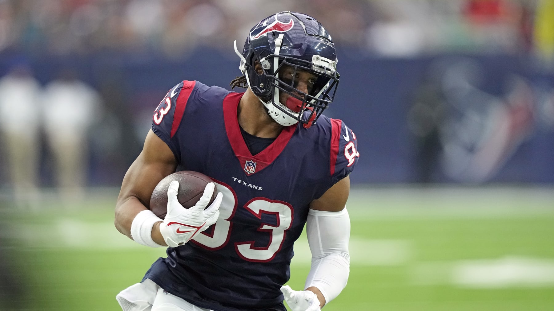 Houston Texans tight end O.J. Howard (83) runs with the ball against the Jacksonville Jaguars during the first half of an NFL football game Sunday, Jan. 1, 2023, in Houston. (AP Photo/David J. Phillip)