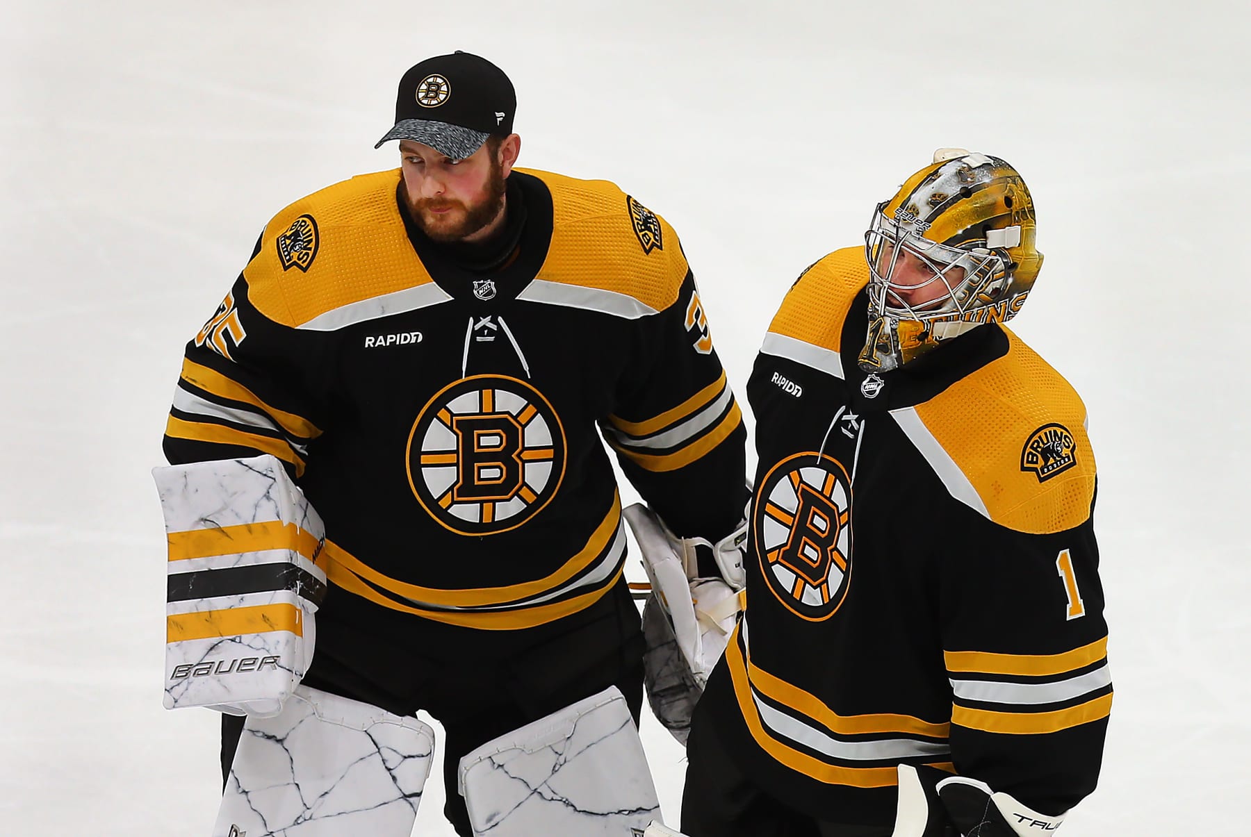 Boston, MA - April 30: Boston Bruins goalies Linus Ullmark and Jeremy Swayman after the game. The Bruins lost to the Florida Panthers, 4-3, in Game 7 of their Eastern Conference First Round Series. (Photo by John Tlumacki/The Boston Globe via Getty Images)
