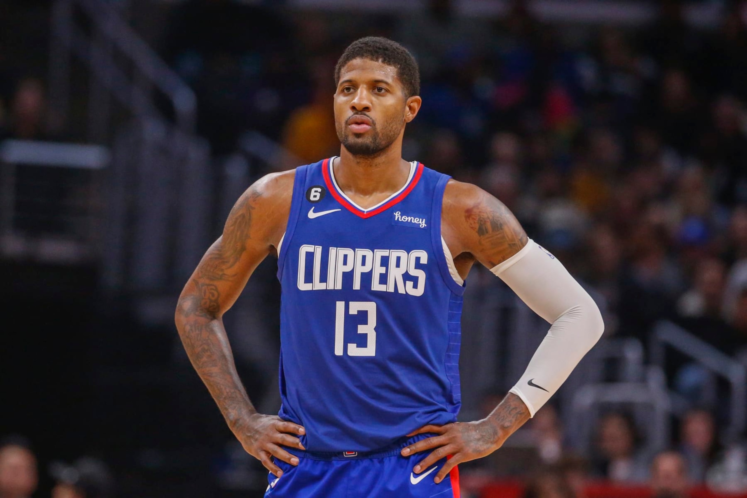 Los Angeles Clippers forward Paul George (13) looks on during the second half of an NBA basketball game agains the Oklahoma City Thunder Tuesday, March 21, 2023, in Los Angeles. (AP Photo/Ringo H.W. Chiu)