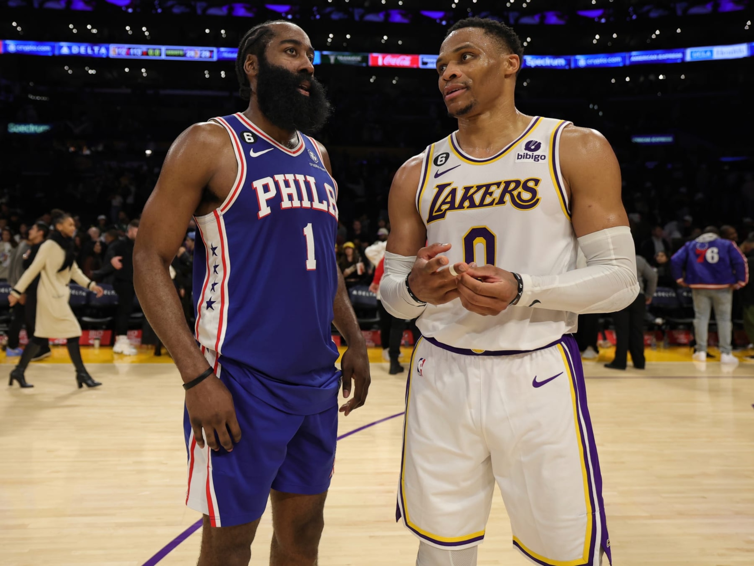 LOS ANGELES, CA - JANUARY 15: Russell Westbrook #0 of the Los Angeles Lakers speaks with James Harden #1 of the Philadelphia 76ers after the game on January 15, 2023 at Crypto.Com Arena in Los Angeles, California. NOTE TO USER: User expressly acknowledges and agrees that, by downloading and/or using this Photograph, user is consenting to the terms and conditions of the Getty Images License Agreement. Mandatory Copyright Notice: Copyright 2023 NBAE (Photo by Jim Poorten/NBAE via Getty Images)