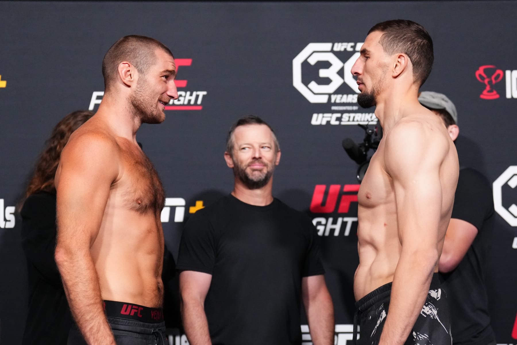 LAS VEGAS, NEVADA - JUNE 30:  (L-R) Sean Strickland and Abus Magomedov of Russia face off during the UFC Fight Night weigh-in at UFC Apex on June 30, 2023 in Las Vegas, Nevada. (Photo by Chris Unger/Zuffa LLC)
