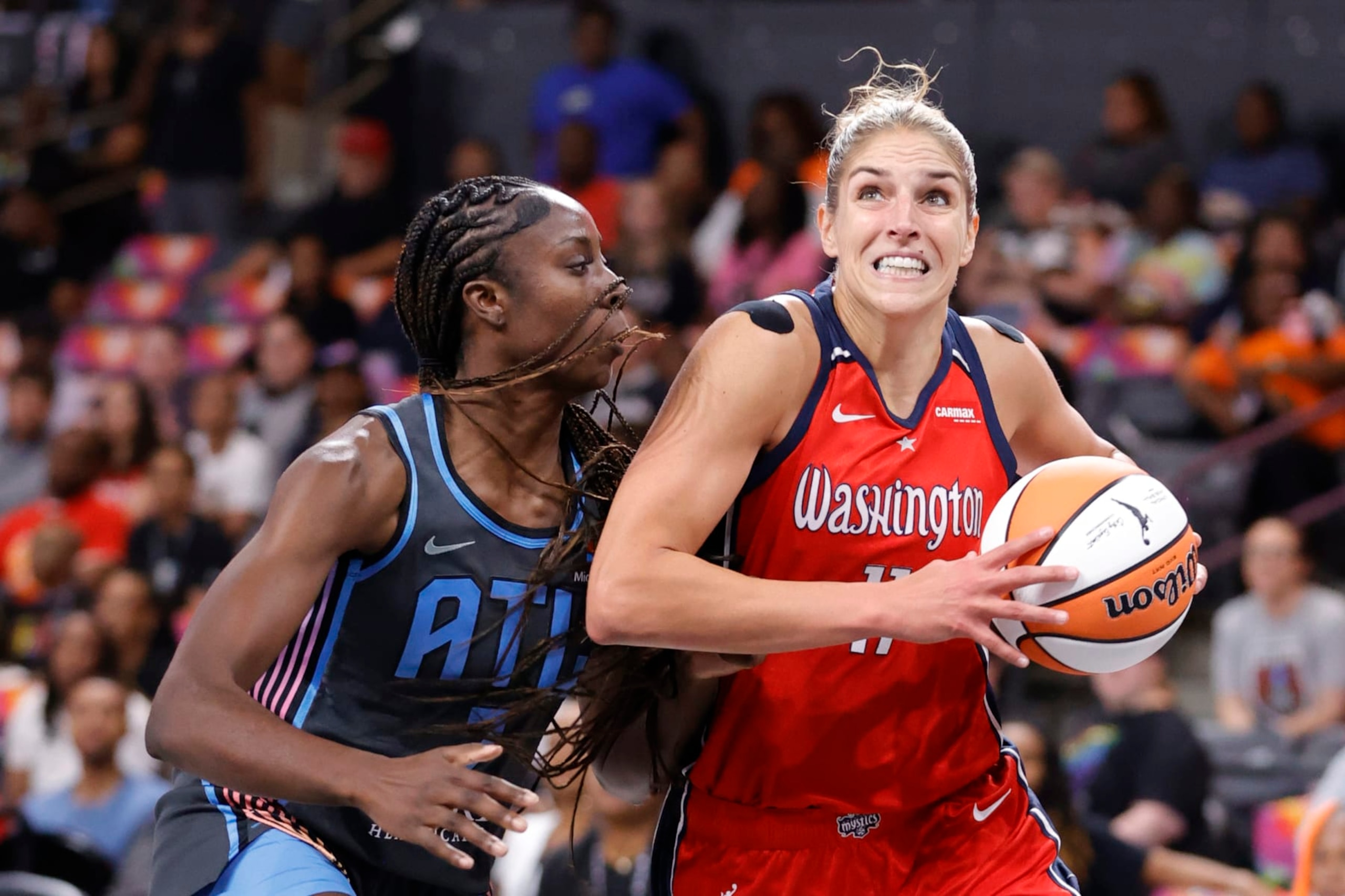 COLLEGE PARK, GEORGIA - JUNE 30: Elena Delle Donne #11 of the Washington Mystics drives against Laeticia Amihere #7 of the Atlanta Dream during the first half at Gateway Center Arena on June 30, 2023 in College Park, Georgia. NOTE TO USER: User expressly acknowledges and agrees that, by downloading and or using this photograph, User is consenting to the terms and conditions of the Getty Images License Agreement. (Photo by Alex Slitz/Getty Images) COLLEGE PARK, GEORGIA - JUNE 30: Elena Delle Donne #11 of the Washington Mystics drives against Laeticia Amihere #7 of the Atlanta Dream during the first half at Gateway Center Arena on June 30, 2023 in College Park, Georgia. NOTE TO USER: User expressly acknowledges and agrees that, by downloading and or using this photograph, User is consenting to the terms and conditions of the Getty Images License Agreement. (Photo by Alex Slitz/Getty Images)